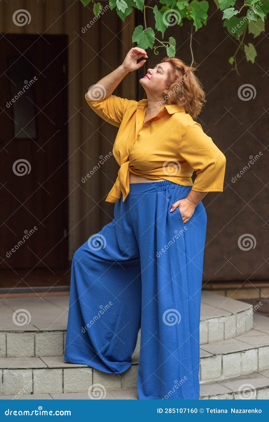 Plump Lady in Fashionable Clothes, Woman of 50-55 Years Old Stock