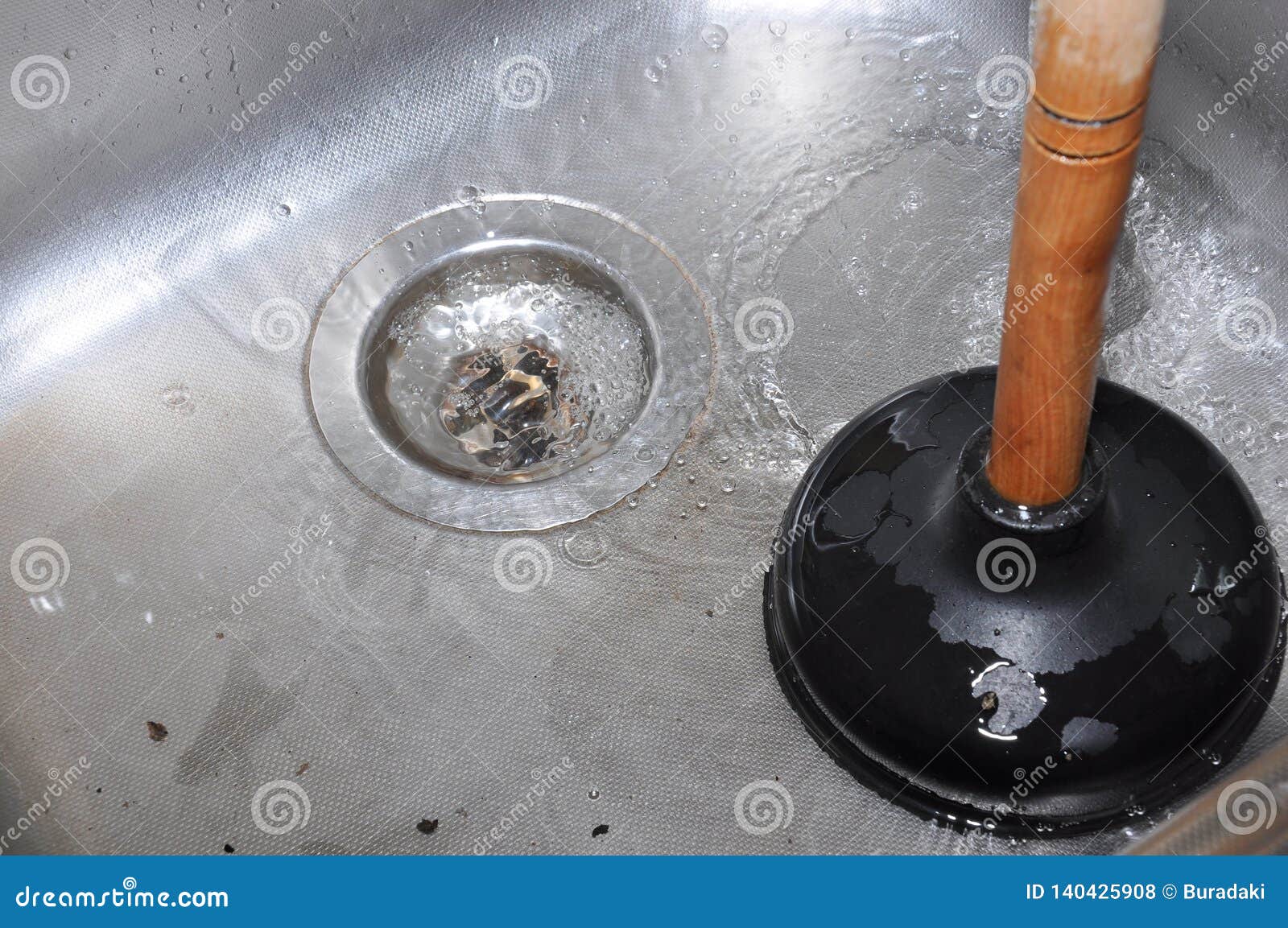 plunger on kitchen sink