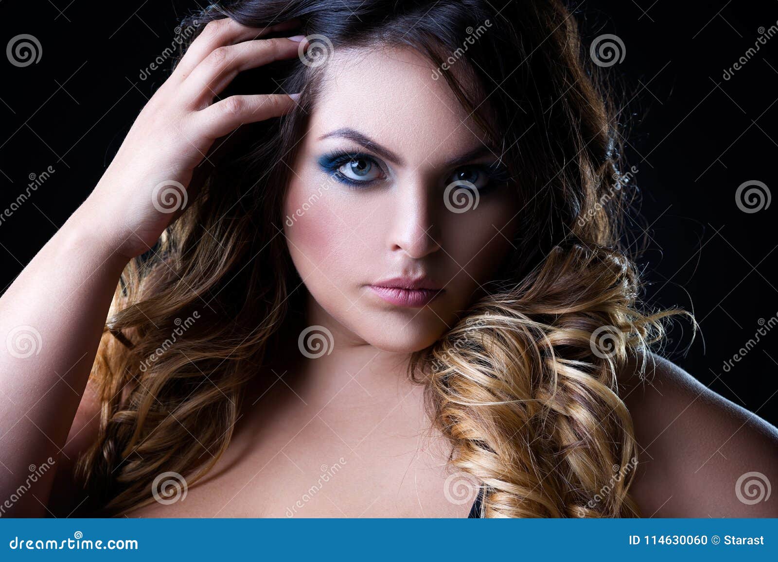 Portrait of Pensive Afro Hairstyle Professional Woman Stock Photo