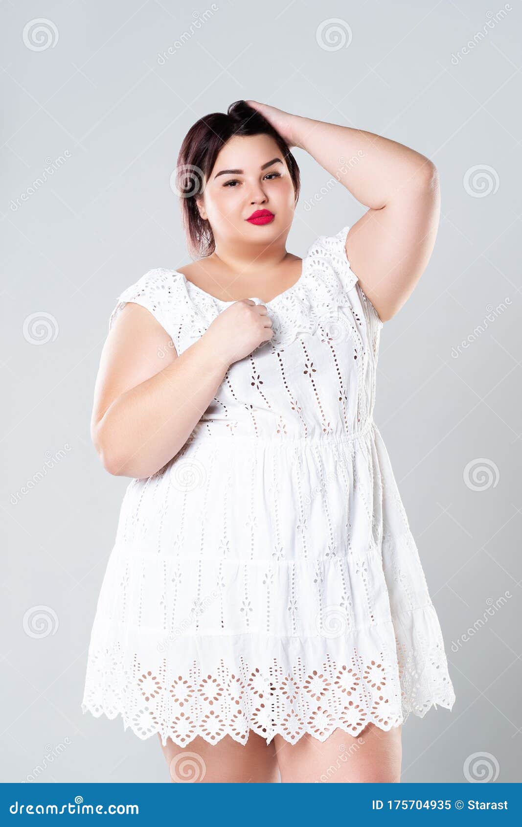 Plus Size Fashion Model In Casual Clothes Fat Woman On Gray Background