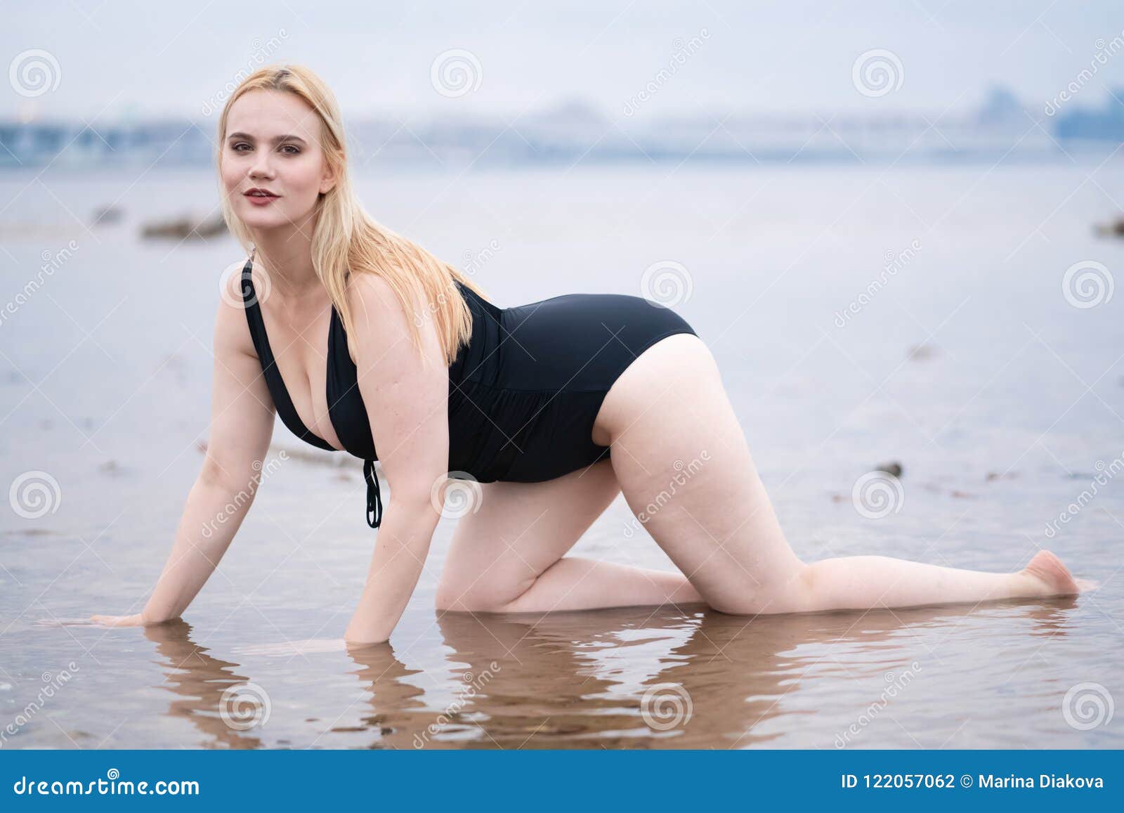 Plus Size Model Wearing Fashion Swimsuit Stock Photo - Image background: 122057062