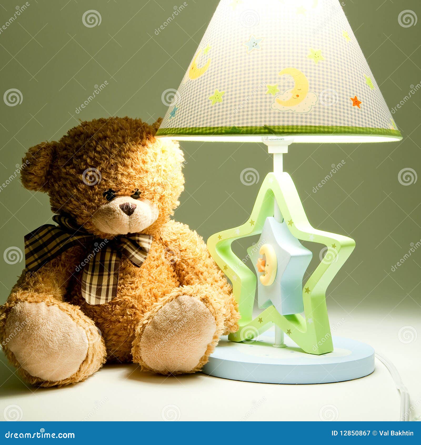 Plush bear and lamp stock image. Image of plush, lampshade 12850867