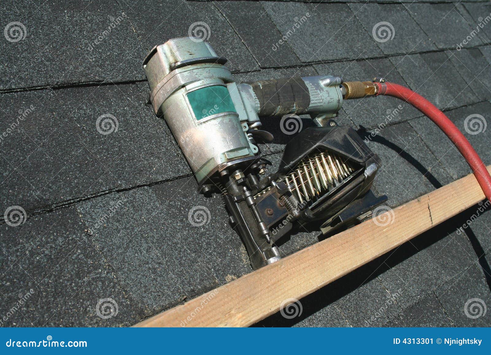 Pneumatic roofing nail gun stock image. Image of roofing 4313301