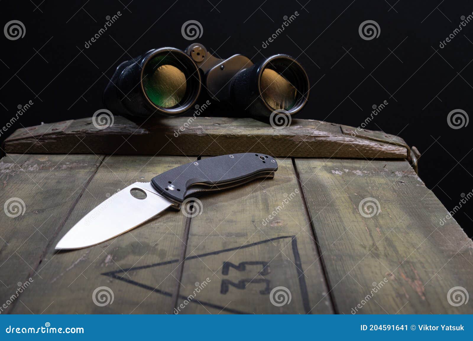 Pocket Knife and Binoculars. Knife and Binoculars on the Box Stock ...