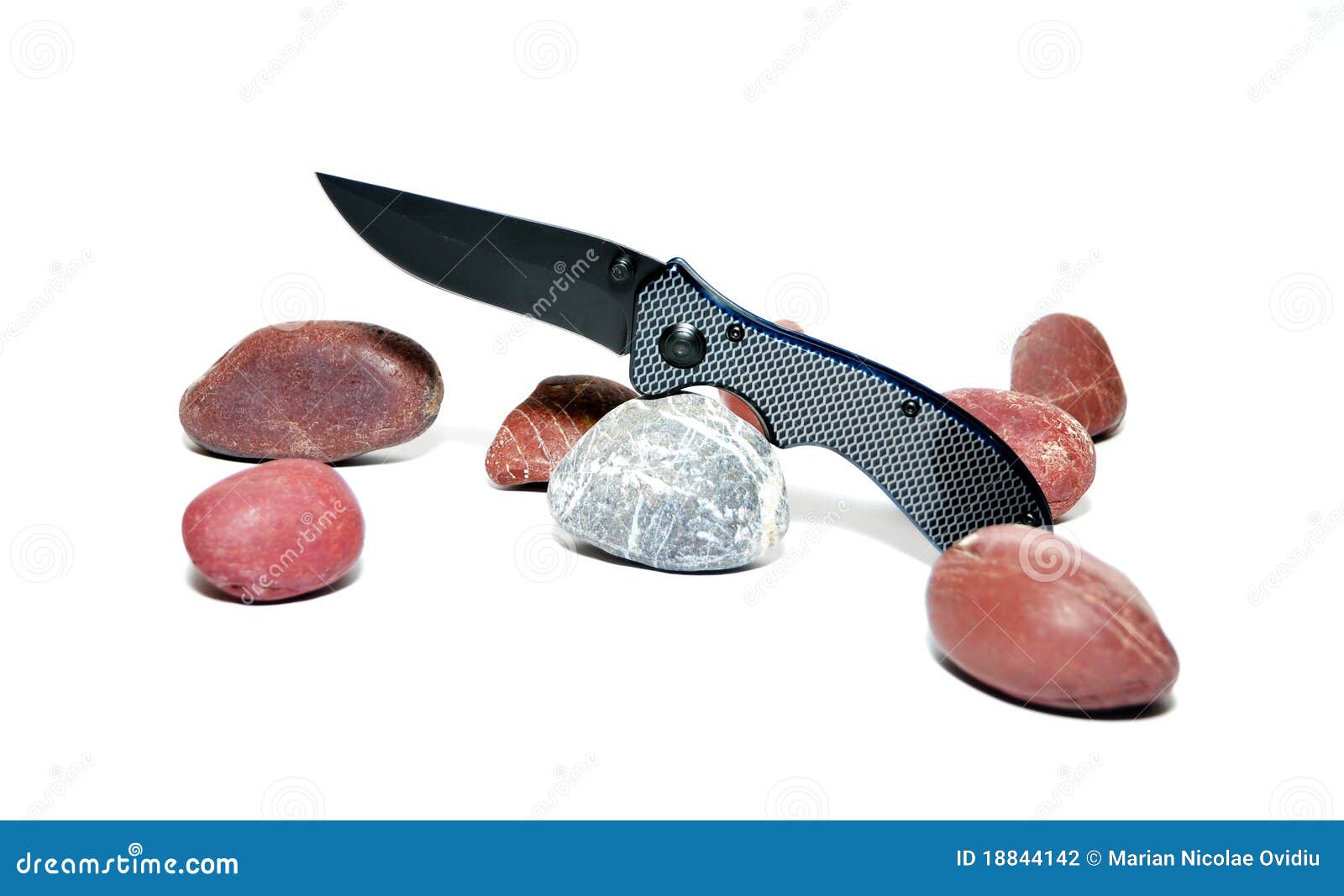 Pocket knife with stones stock photo. Image of blade 18844142