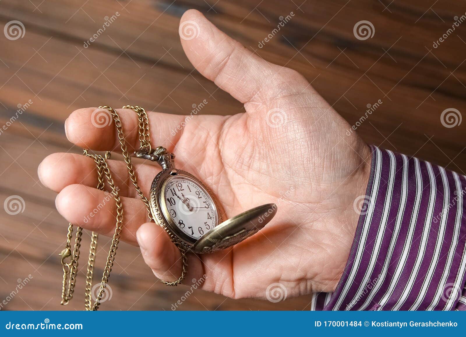 A Pocket Watch in the Hands of a Man Stock Photo Image of equipment