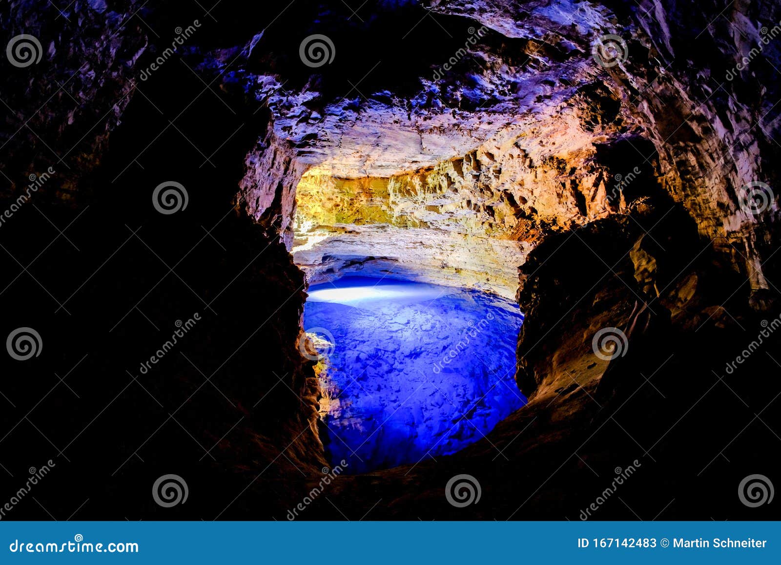 poco encantado, blue lagoon with sunrays inside a cavern in the chapada diamantina, andarai, bahia, brazil