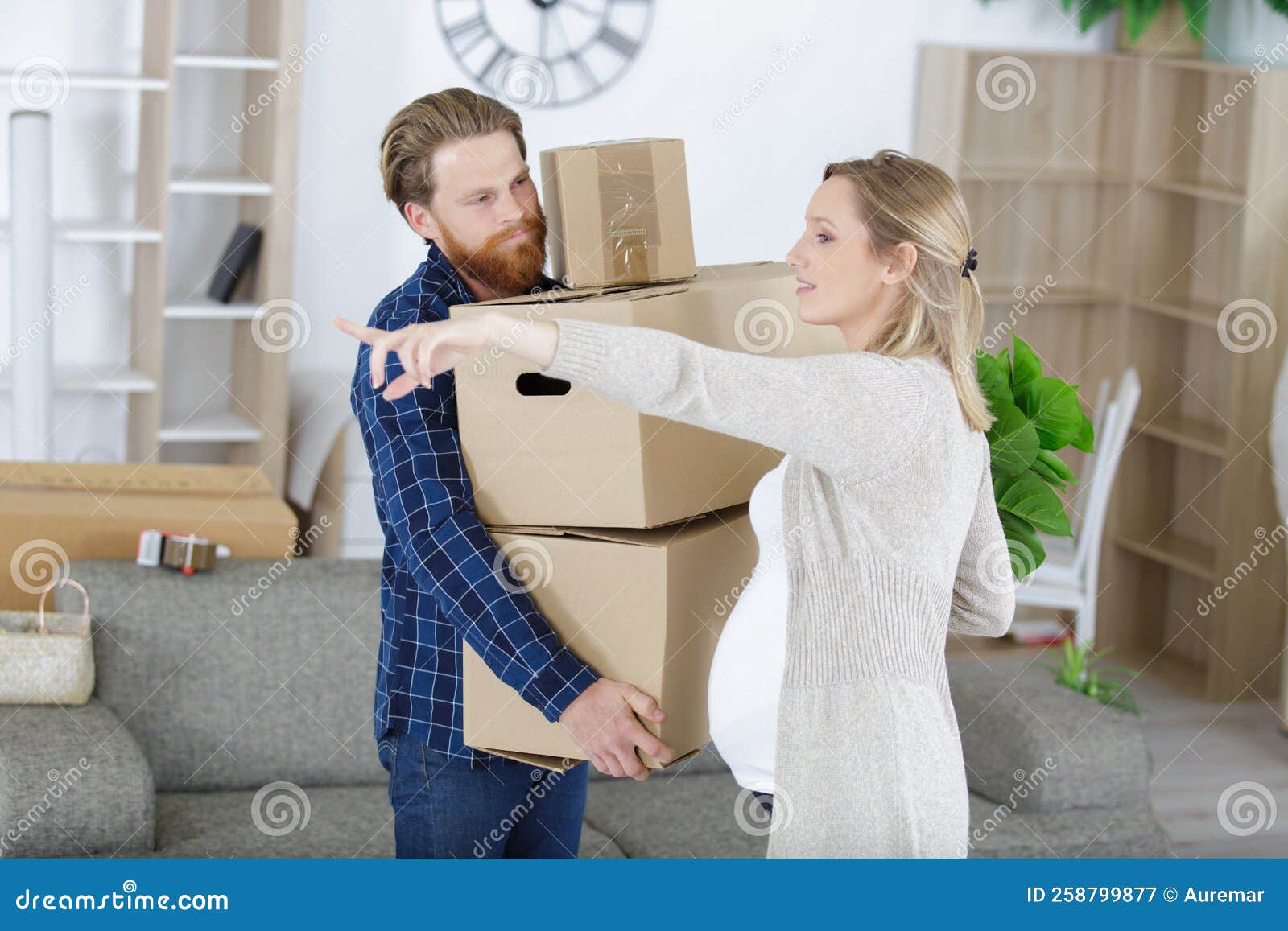 She Pointing at Where To Put Box Stock Image Image of realestate