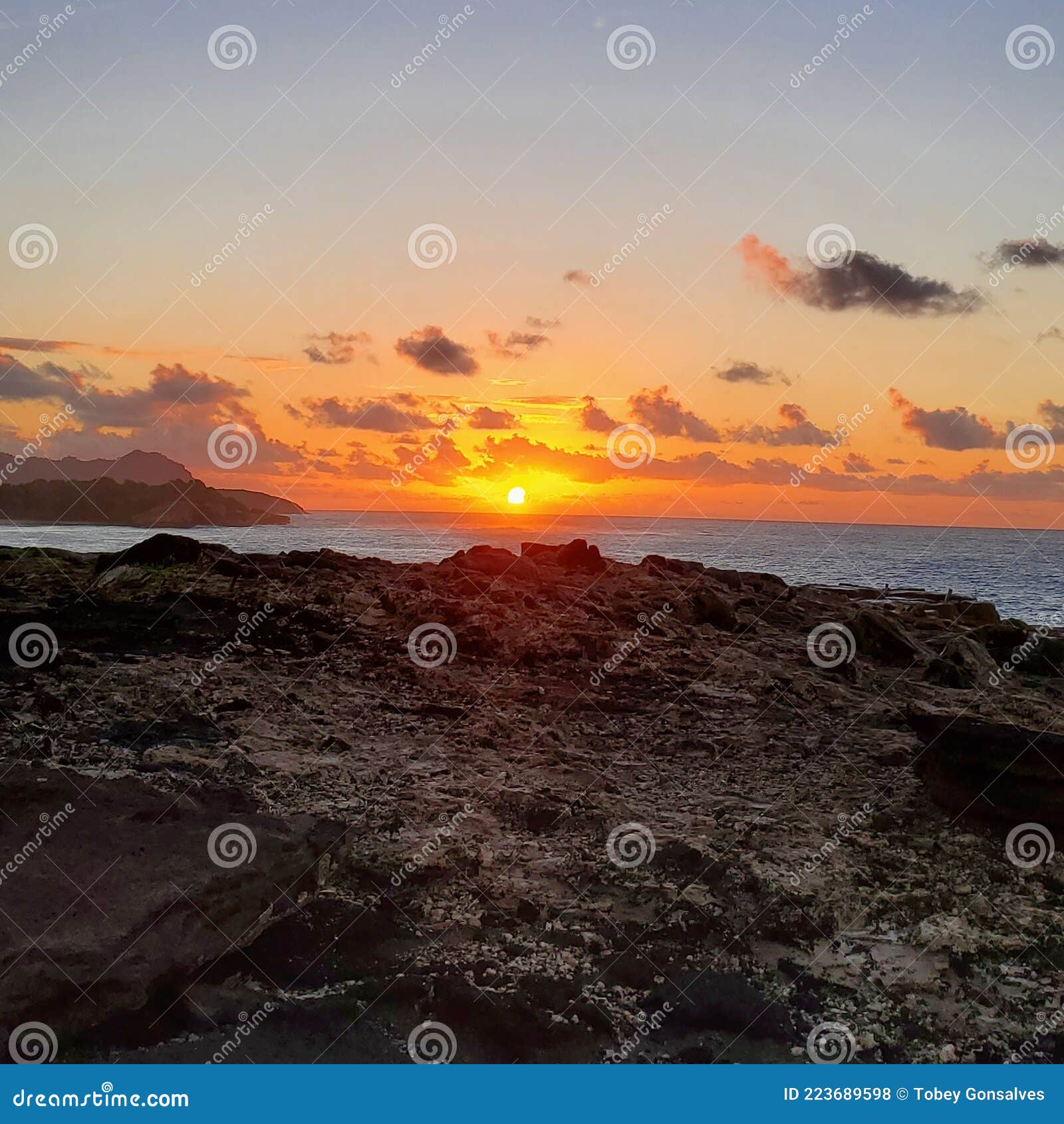Poipu sunrise stock photo. Image of sunset, beach, dawn 223689598