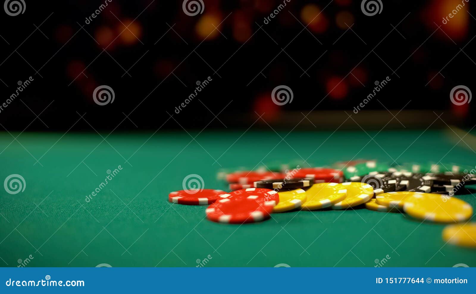 poker chips lying on green table, poker and blackjack casino games, betting