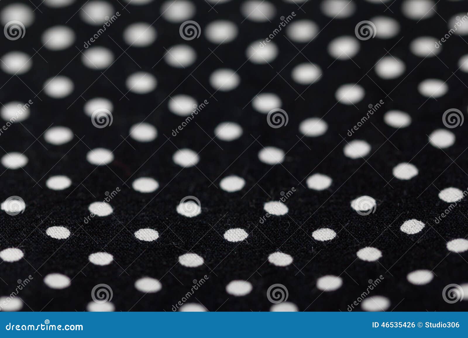 Polca Dots Fabric. Primer minúsculo blanco y negro del fondo de la materia textil de Dots Fabric de la polca