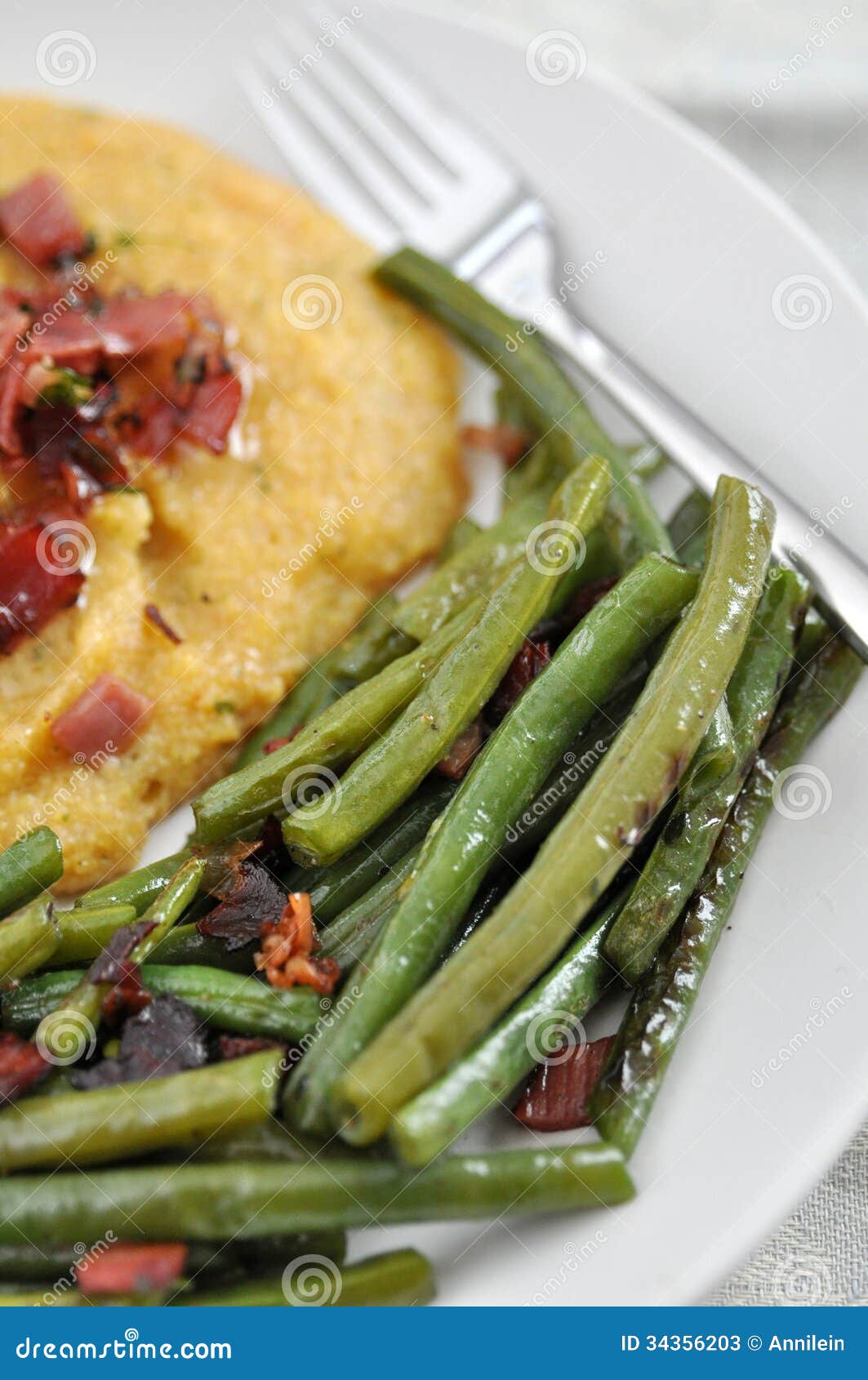 Polenta with green beans stock image. Image of piece 34356203