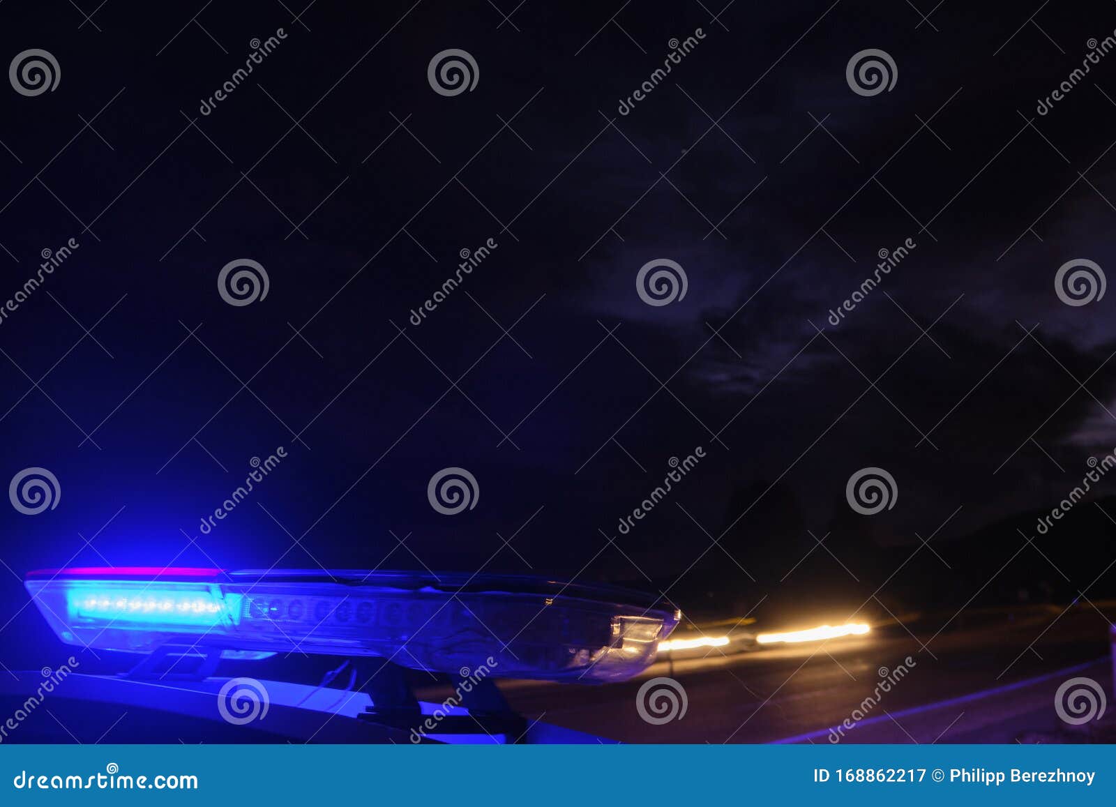 Police Car Flashing Lights in the Night Selective Focus Stock Image