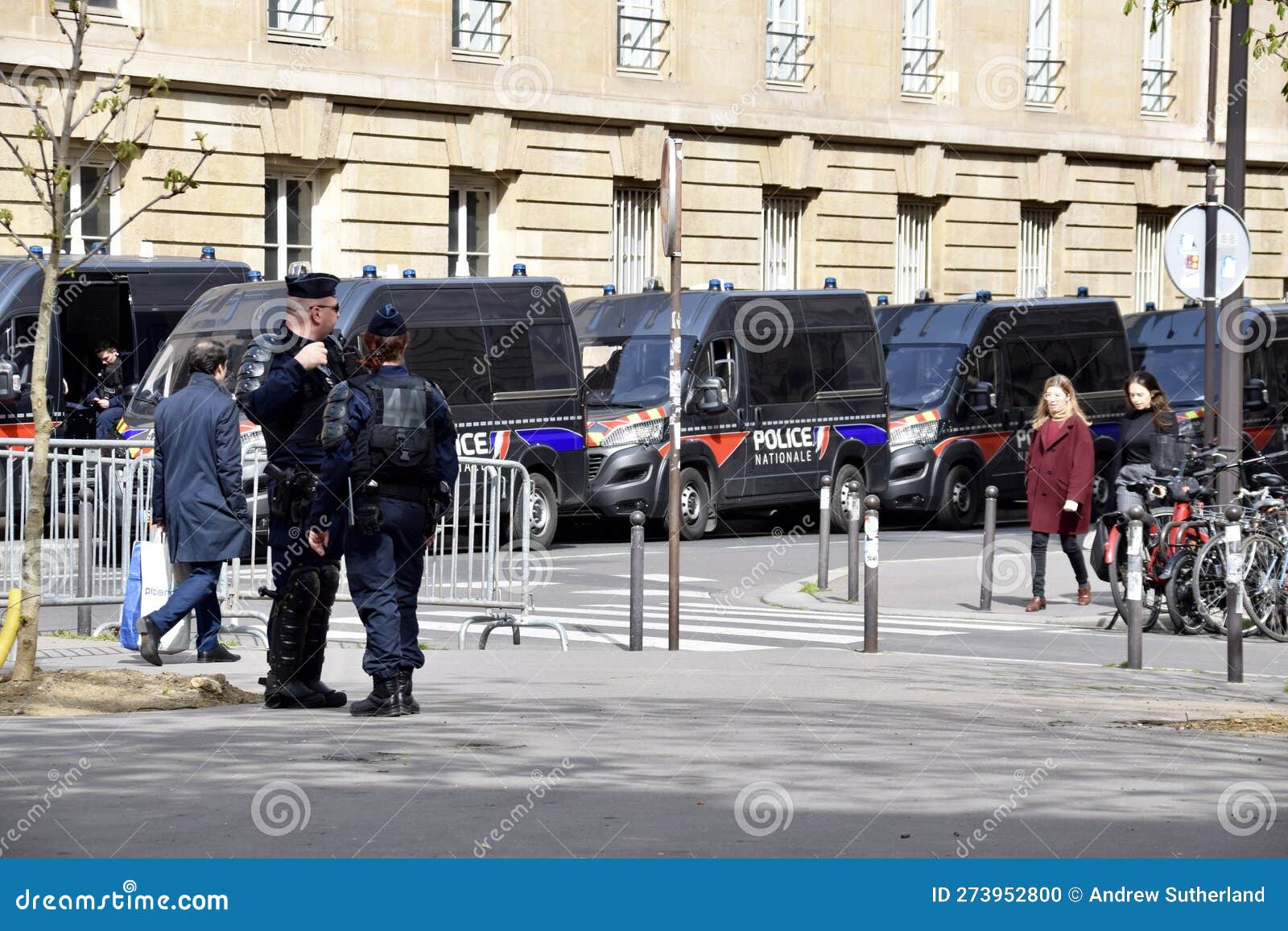 Police Officers with Police Vans on the Street. Paris, France. March 29 ...