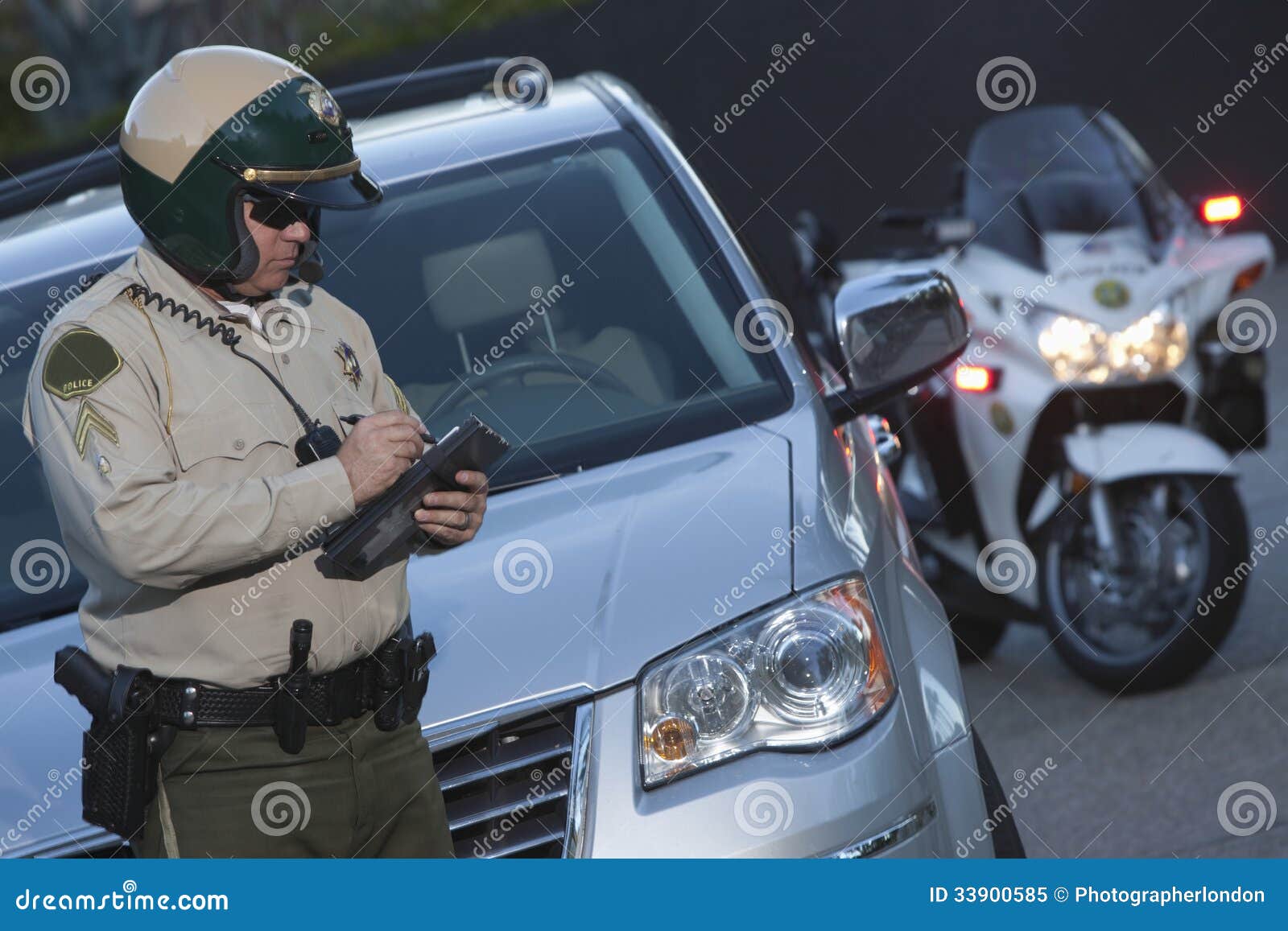 stock photo police writing ticket stock photo police writing ticket