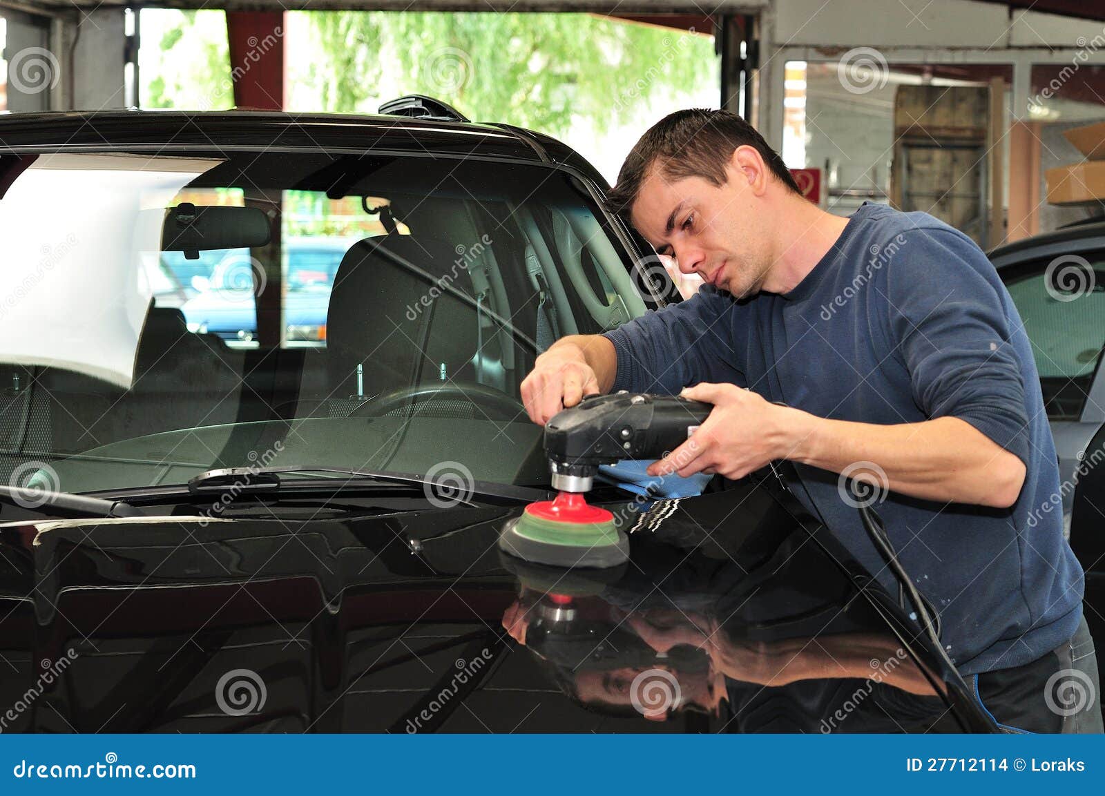 Polishing a car. stock photo. Image of motor, service 27712114