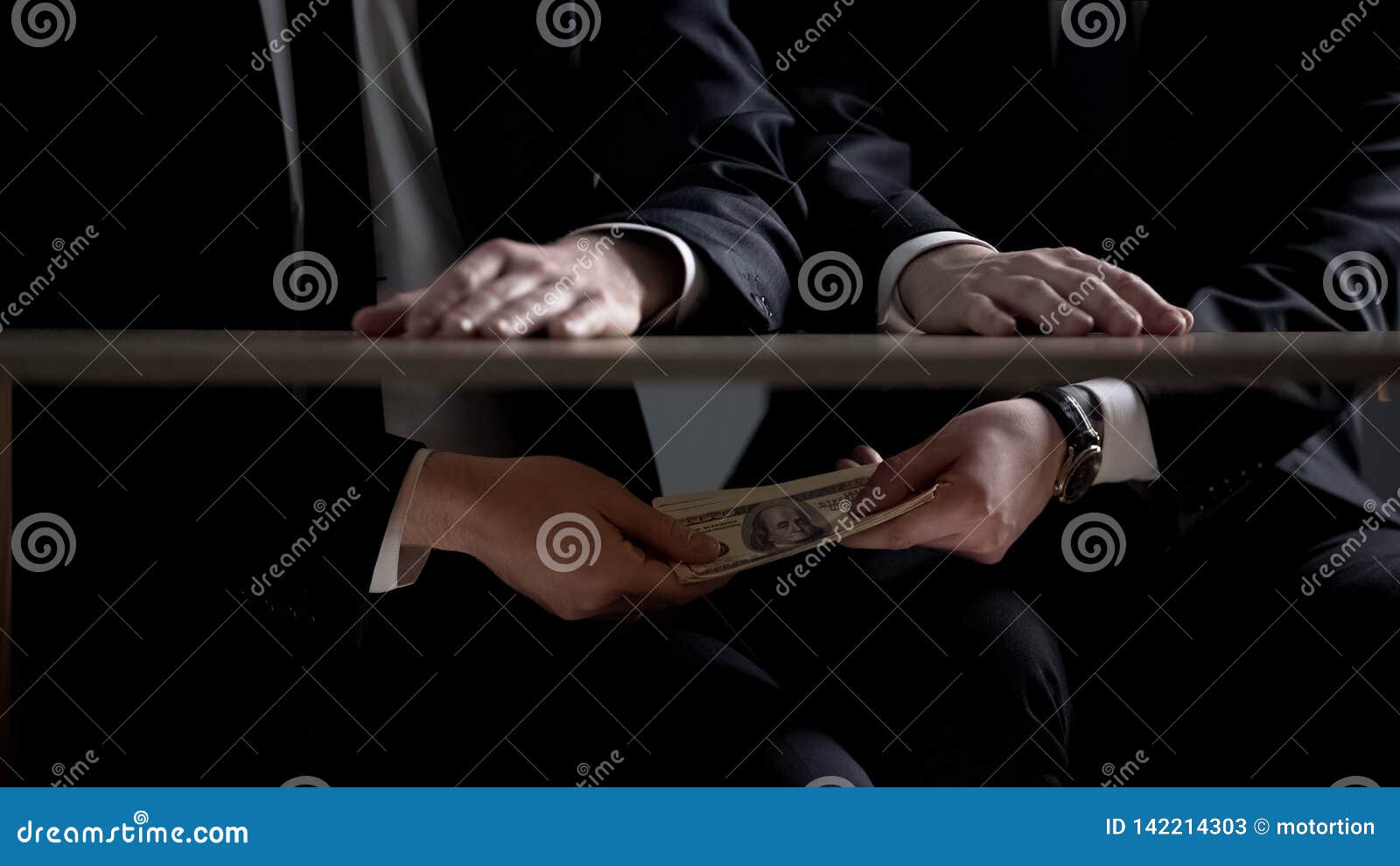 politician hands taking bribe money under office table, lobbying of interests