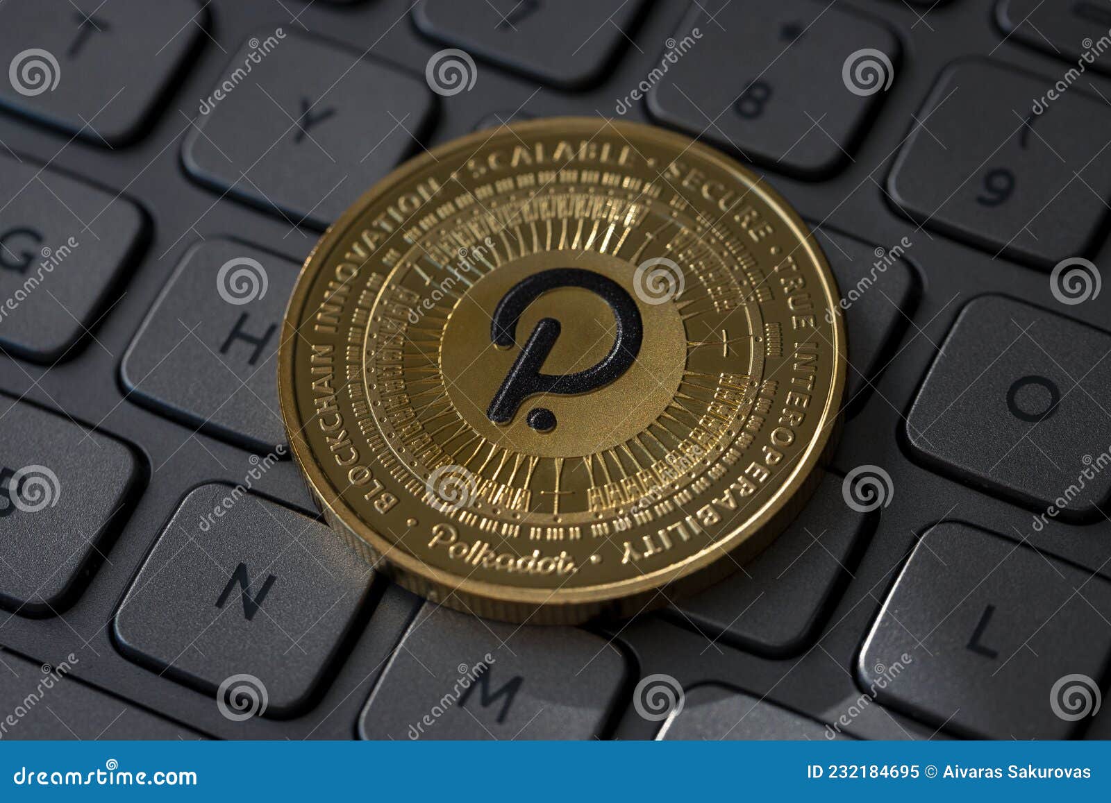 Polkadot DOT Crypto Coin Placed on Computer Keyboard and Lit with Light.  Editorial Image - Image of confirmation, code: 232184695