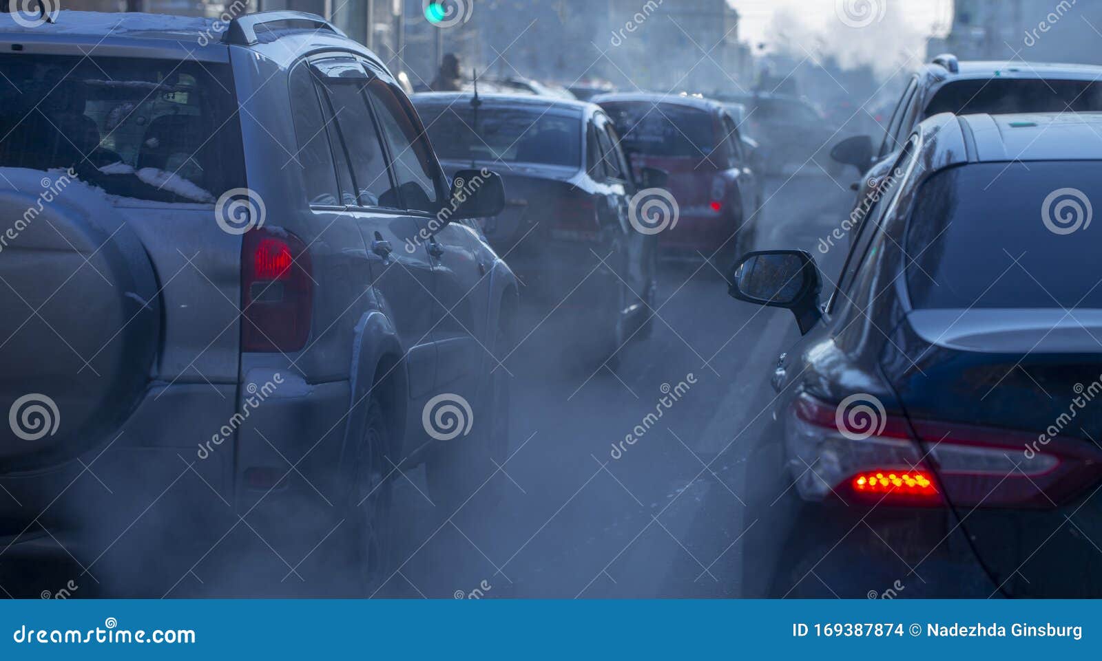 Pollution from the Exhaust of Cars in the City in the Winter. Smoke ...