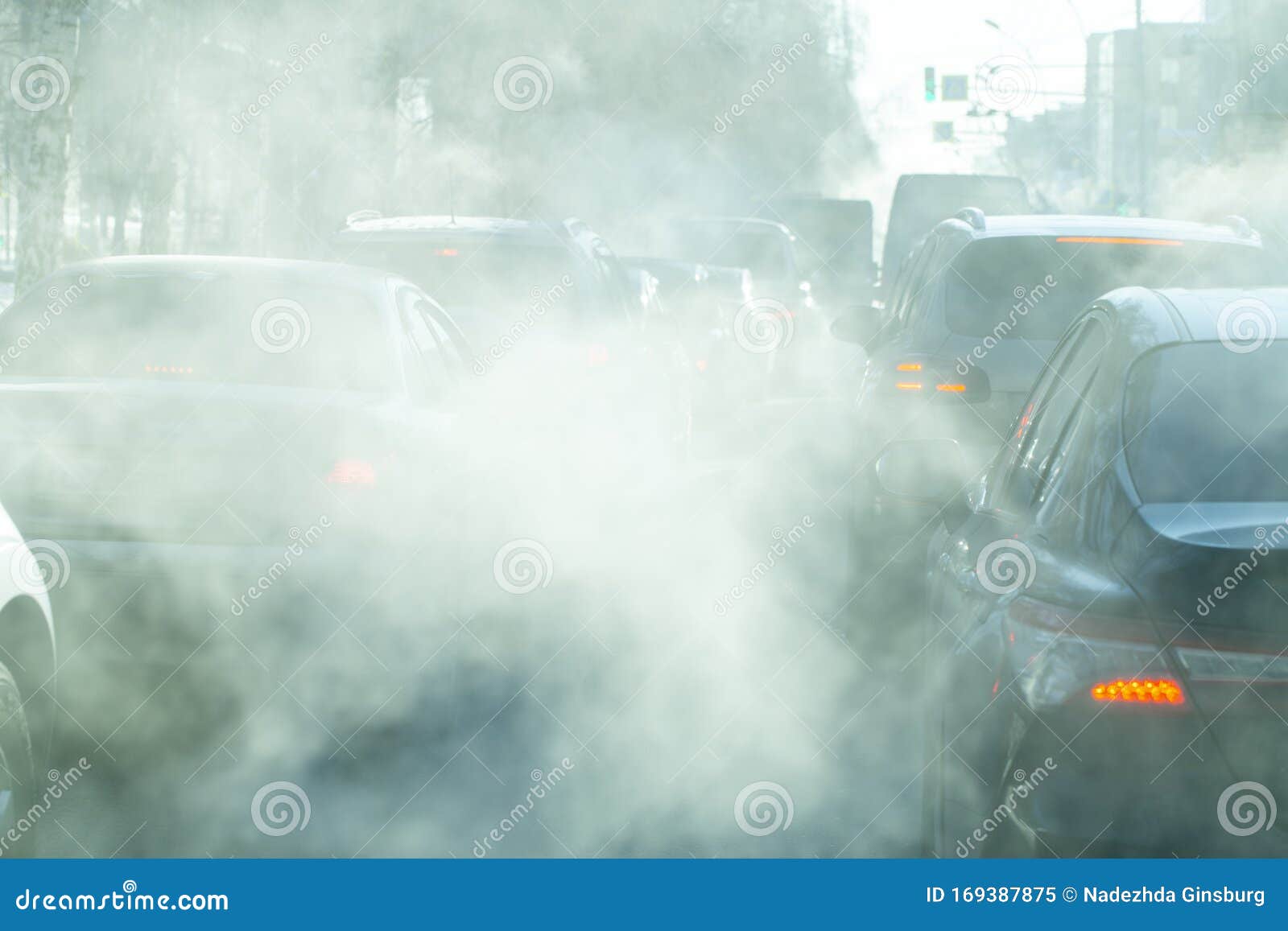 Pollution from the Exhaust of Cars in the City in the Winter. Smoke ...