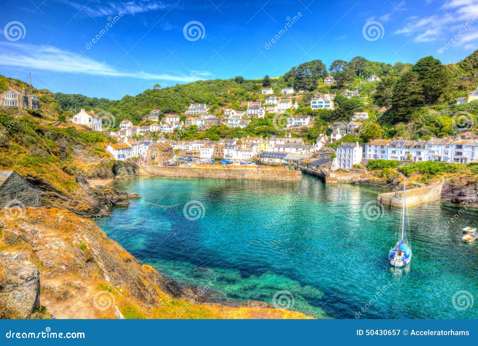 polperro cornwall england uk with clear blue and turquoise sea in vivid colour hdr like painting