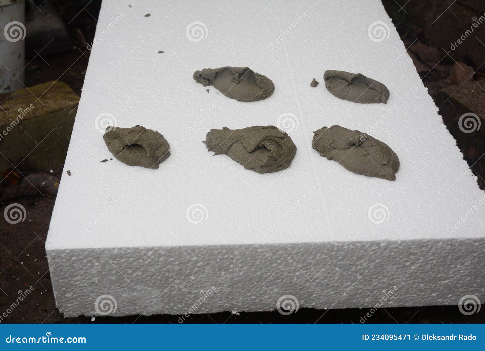 Polystyrene Foam Board External Wall Insulation. Applying Adhesive on