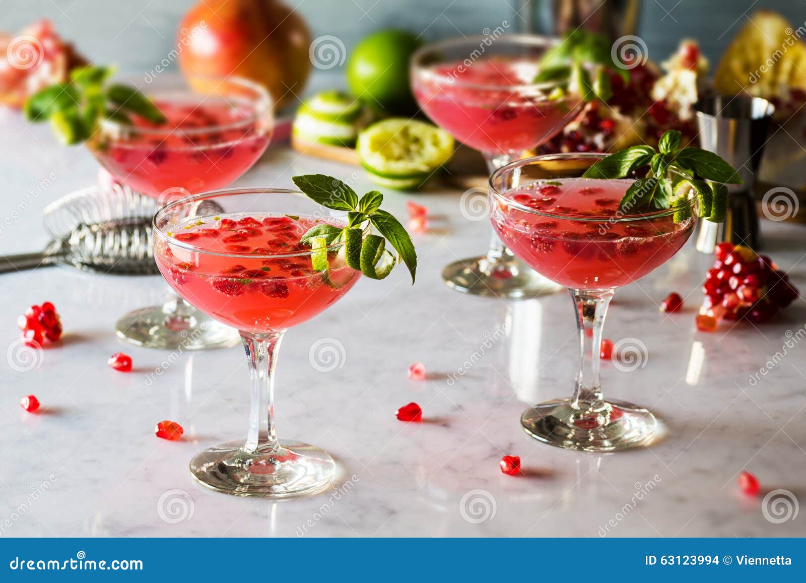 pomegranate basil martini or gin smash cocktail