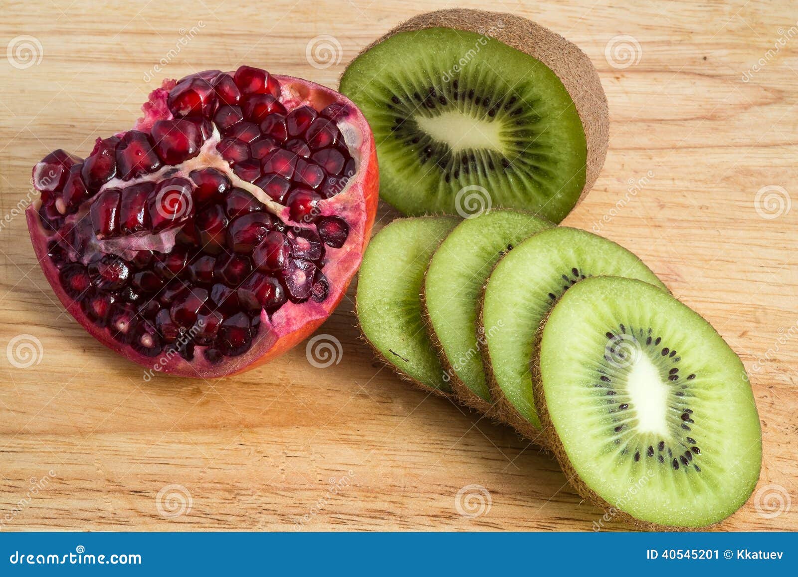 Pomegranate and kiwi stock image. Image of board 40545201