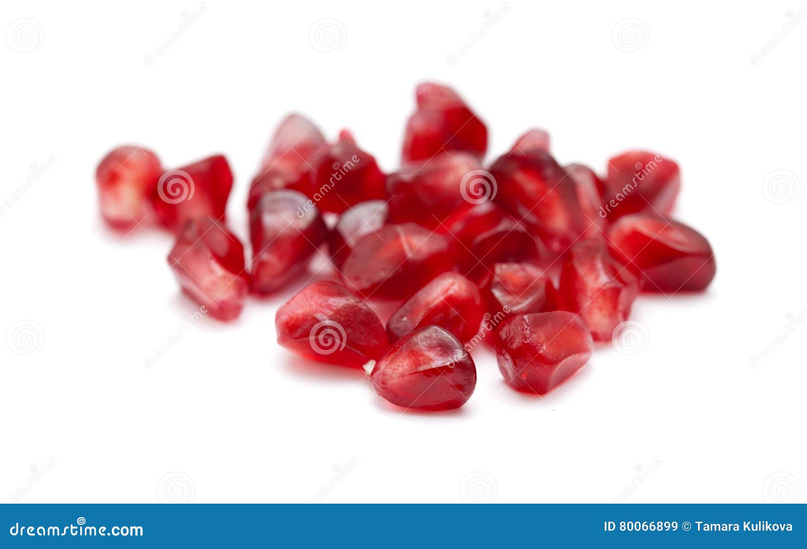 pomegranate seeds  on white