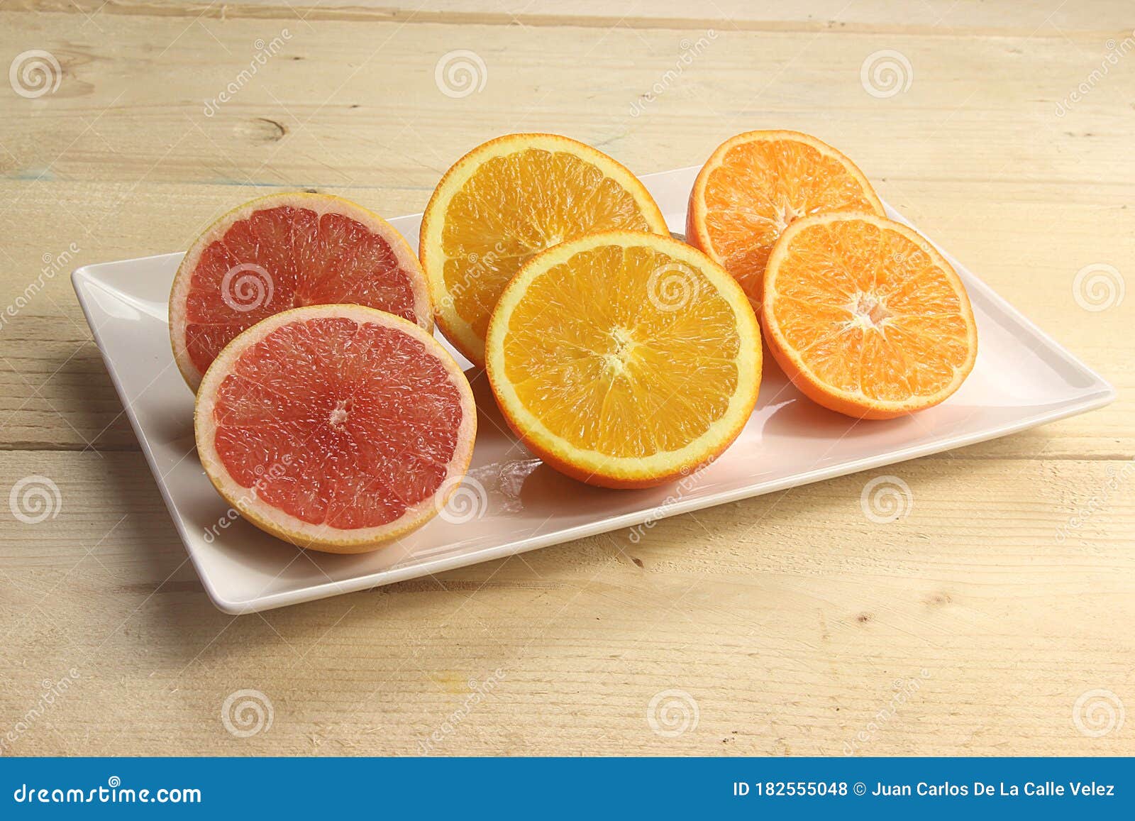 variedad de frutas cÃÂ­tricas como pomelo naranja y mandarina