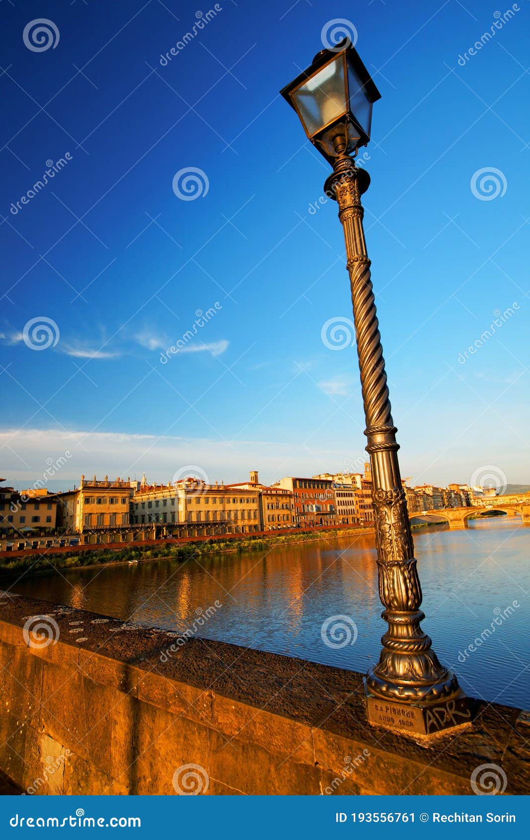 the ponte alla carraia over arno and the right bank of the river in florence.