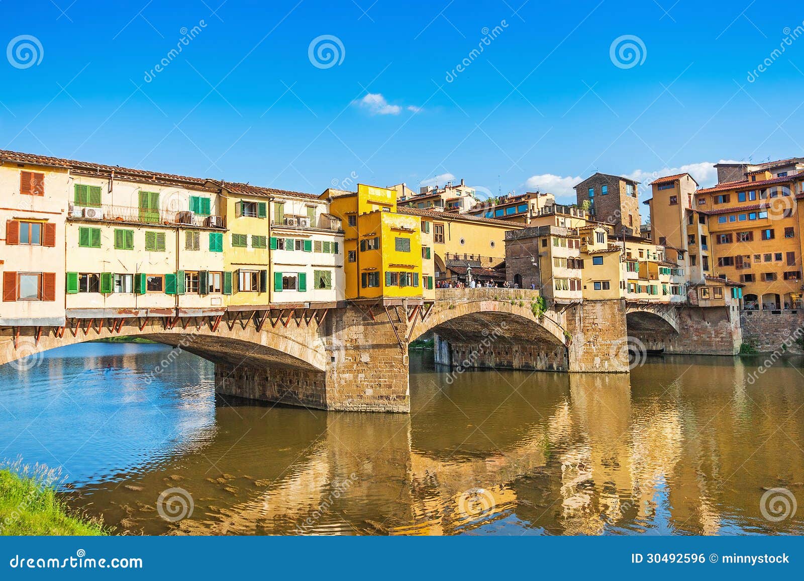 ponte vecchio at sunset in florence, italy