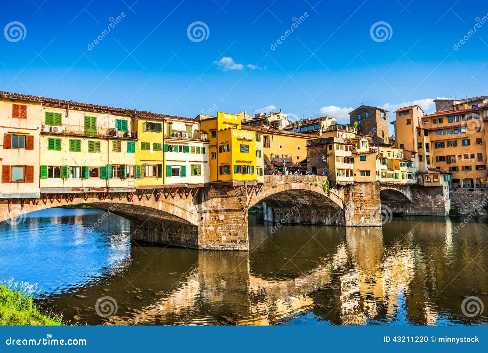 ponte vecchio at sunset in florence, italy