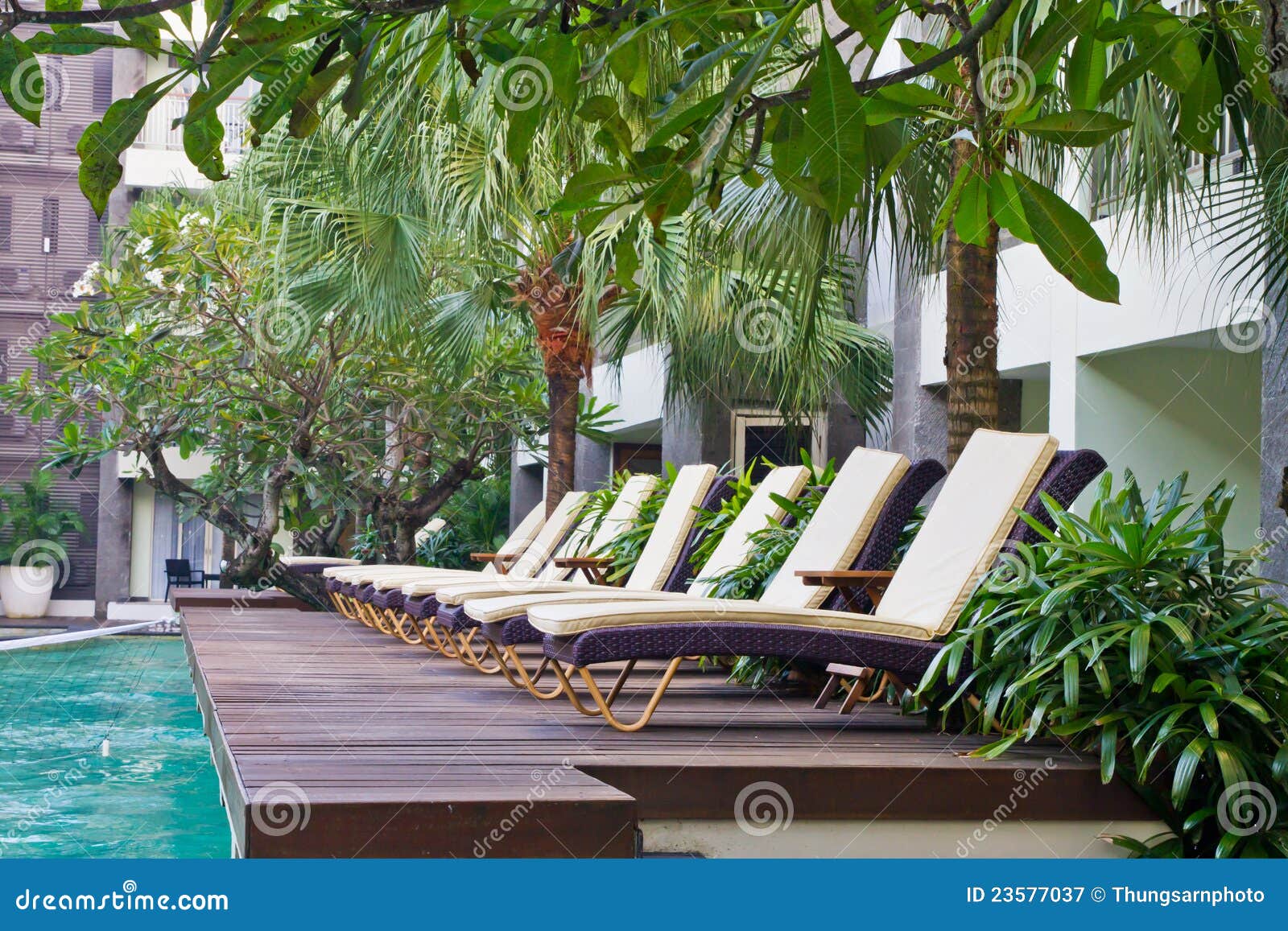 Pool deck chairs stock image. Image of decor, style, beautiful 23577037