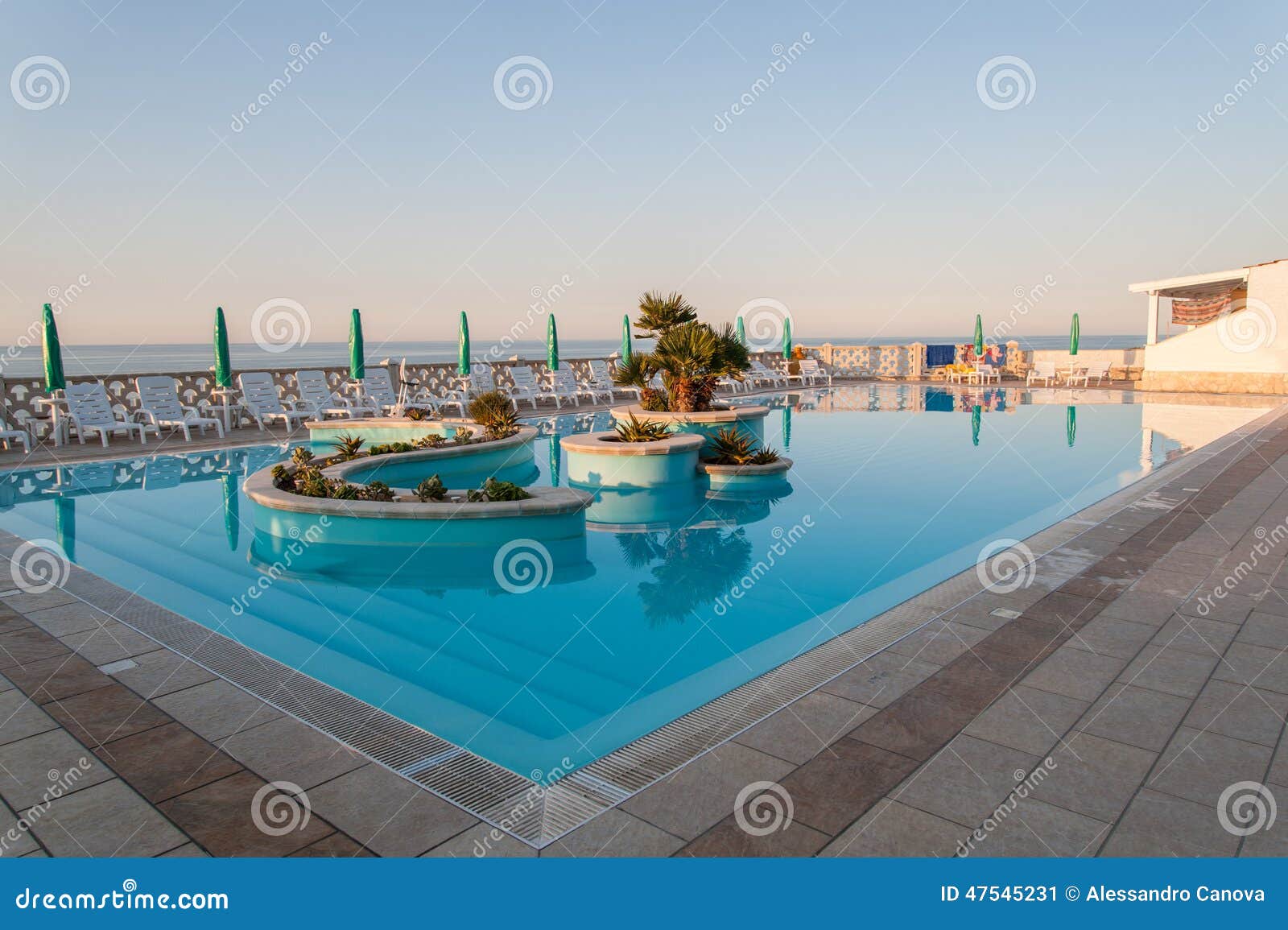 pool overlooking the mediterranean sea in puglia, italy