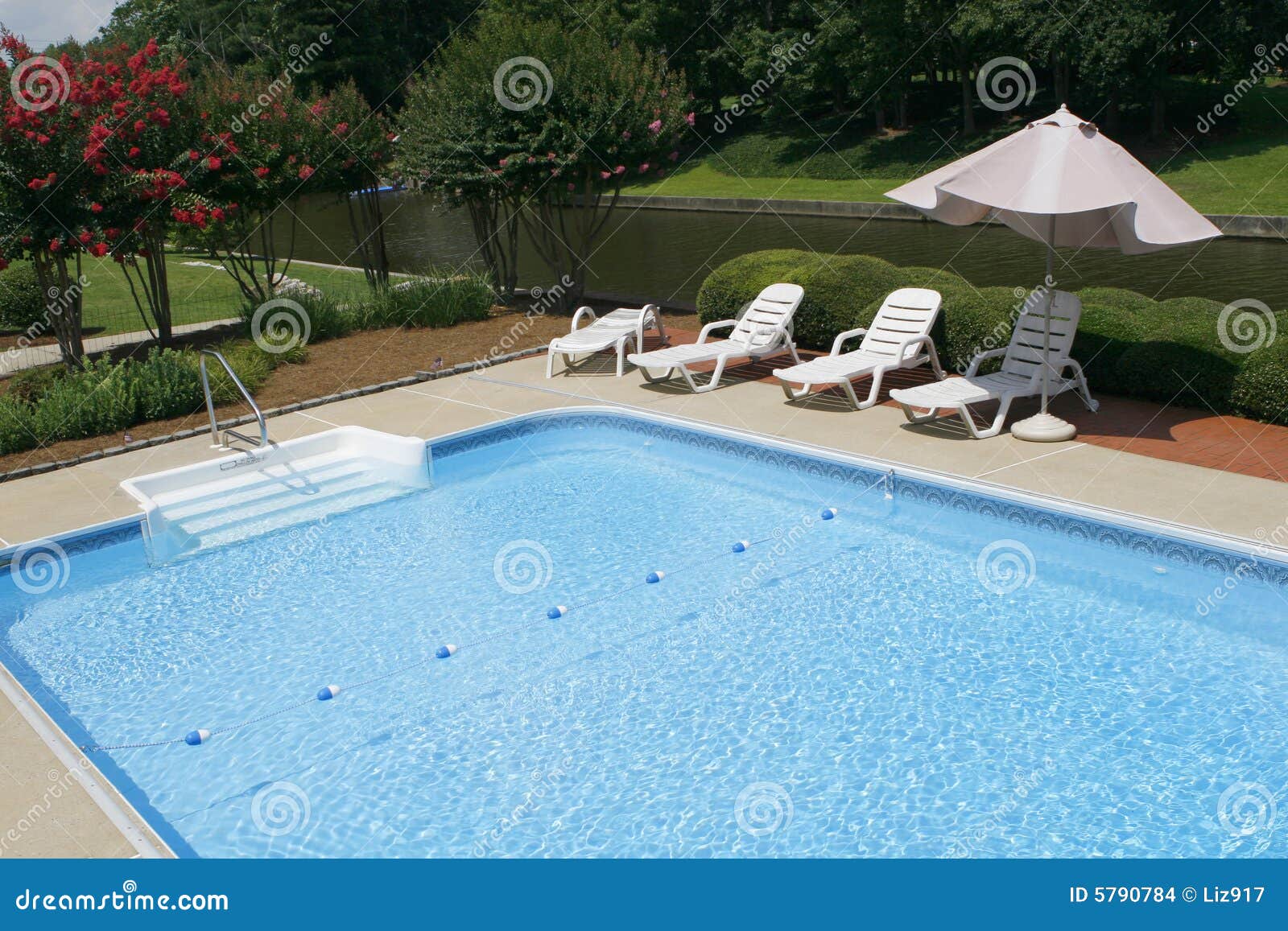 Pool Side with Lounge Chairs and Umbrella Stock Photo Image of