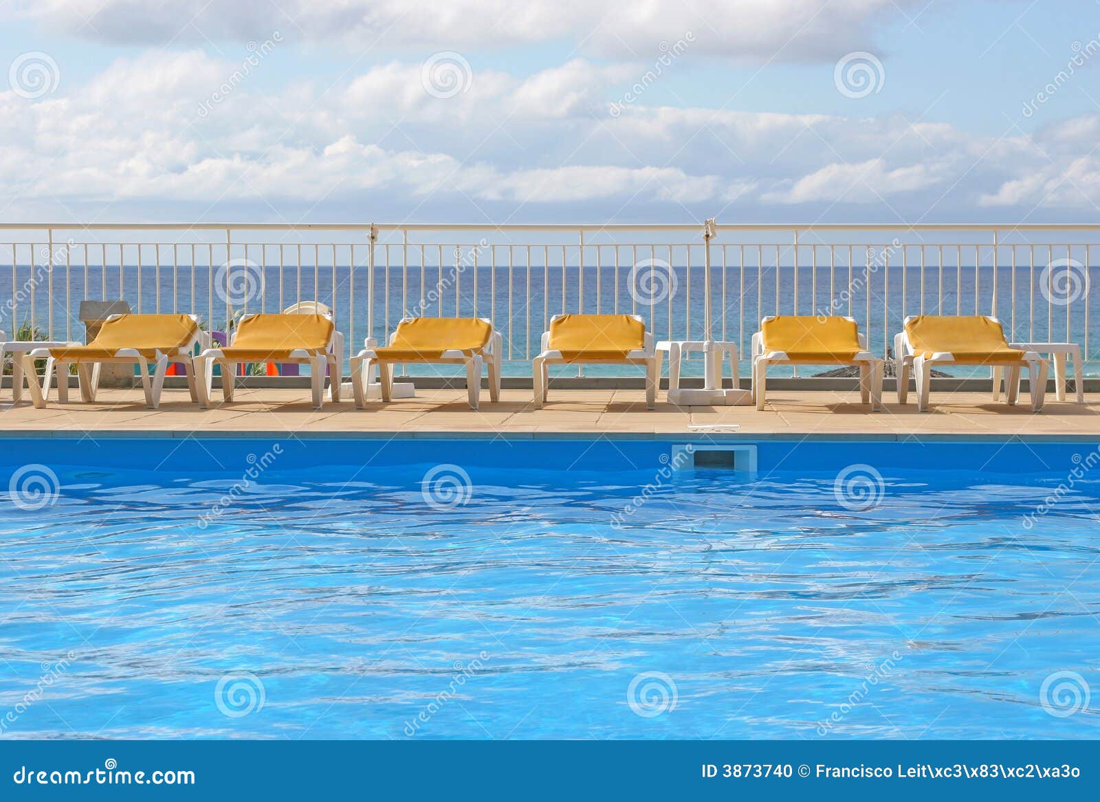 Pool Sunbeds Around A Pool Picture. Image 3873740