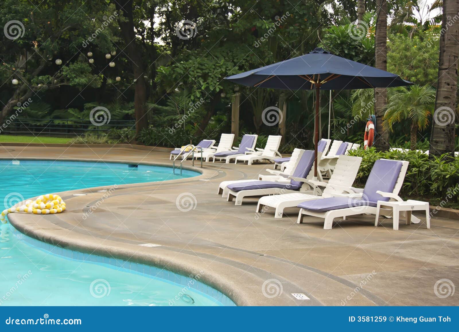 Poolside deck chairs stock image. Image of holiday, chair 3581259