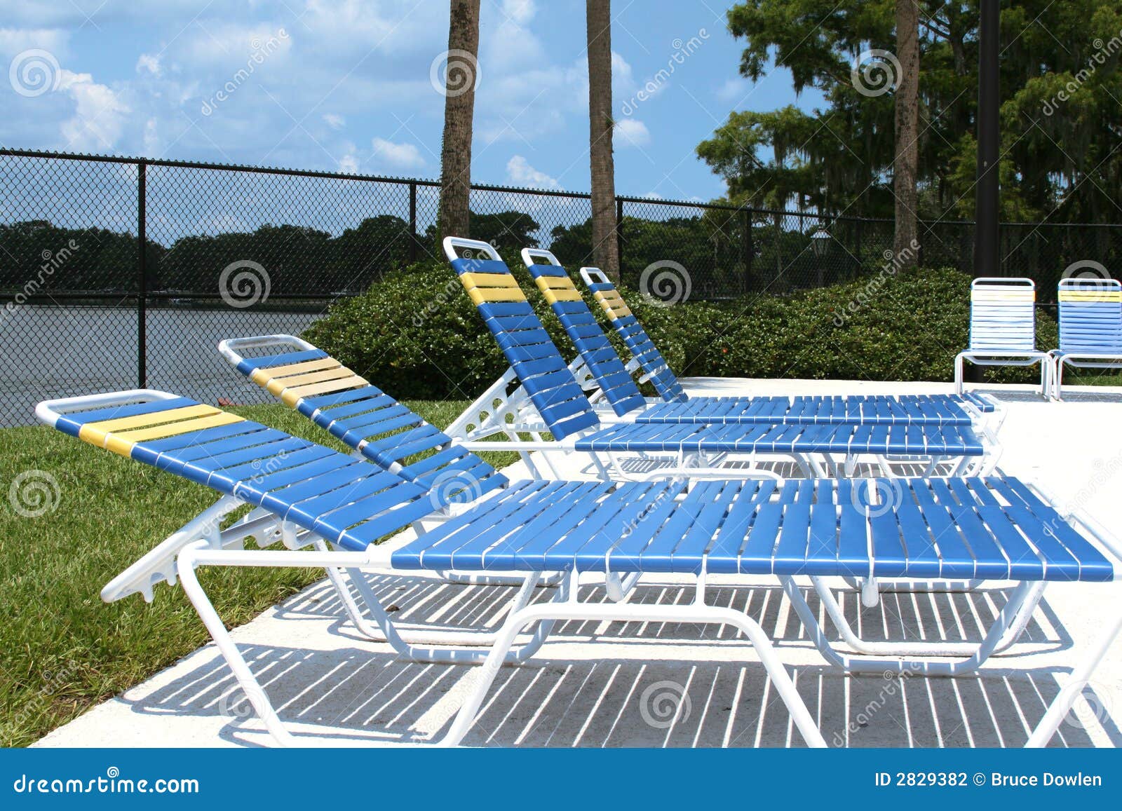 Poolside Lounge Chairs stock photo. Image of lounge, shadows - 2829382