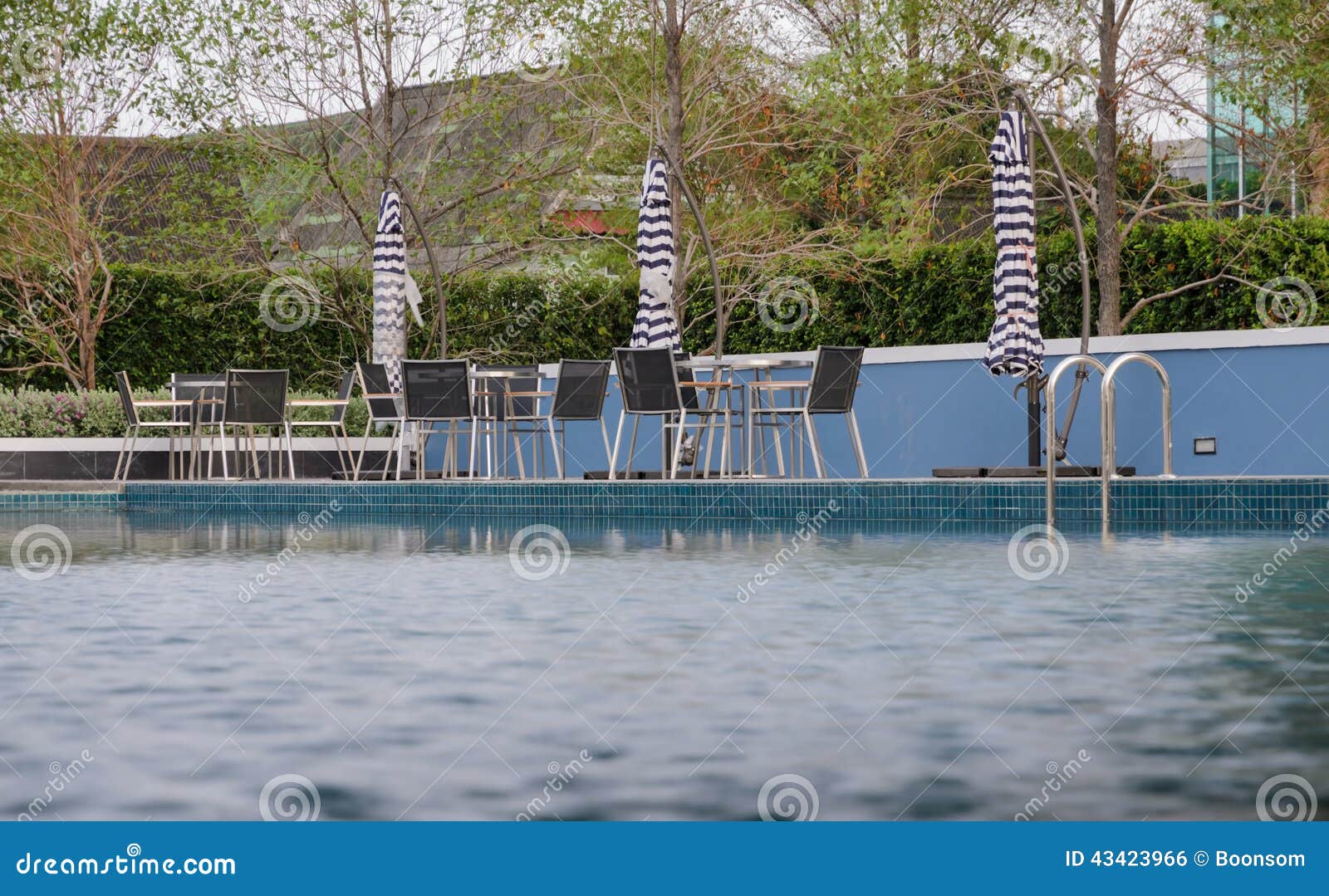 Poolside tables and chairs stock photo. Image of vacation 43423966
