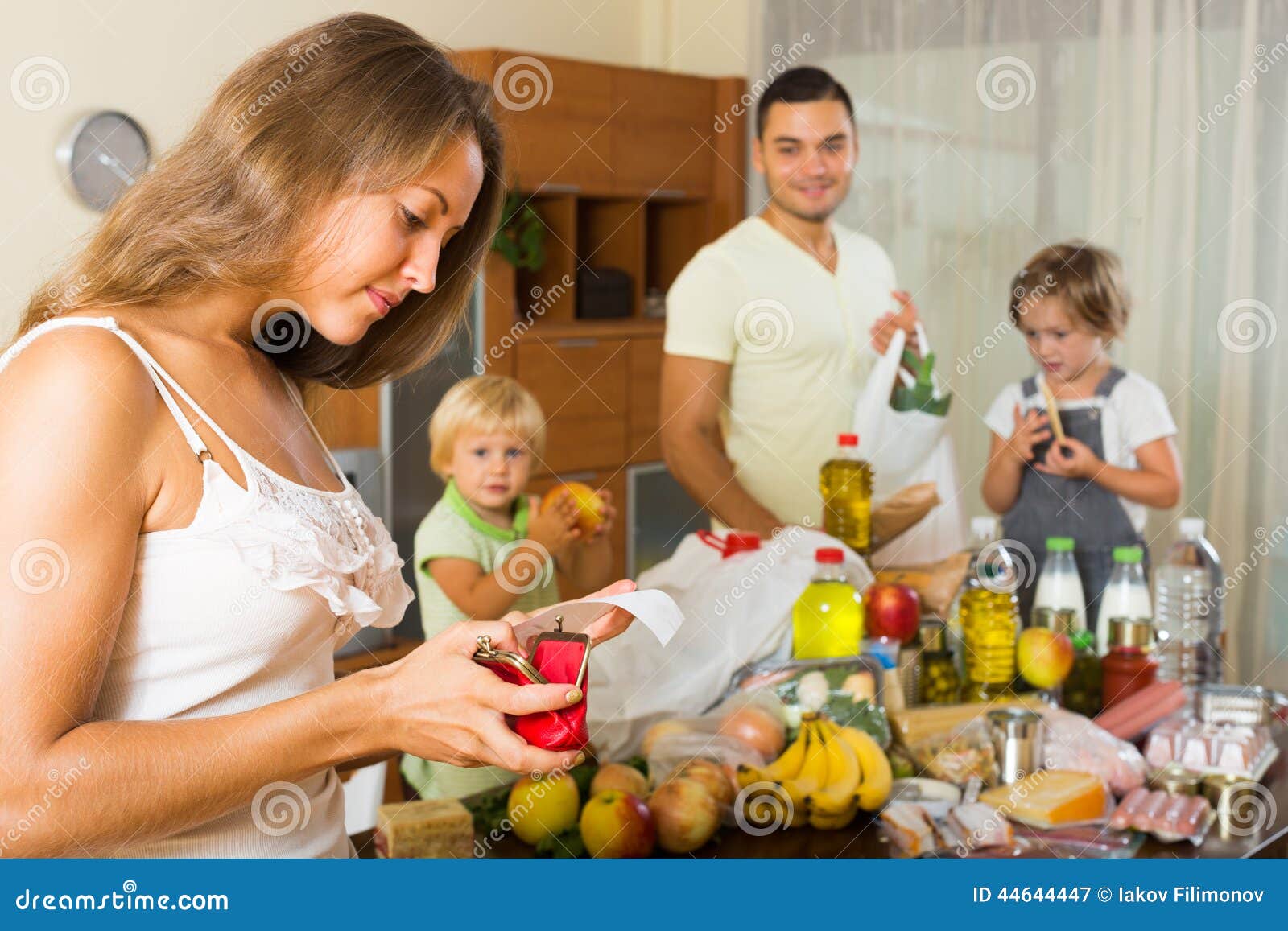 Poor Family with Bags of Food Stock Image - Image of children, indoor