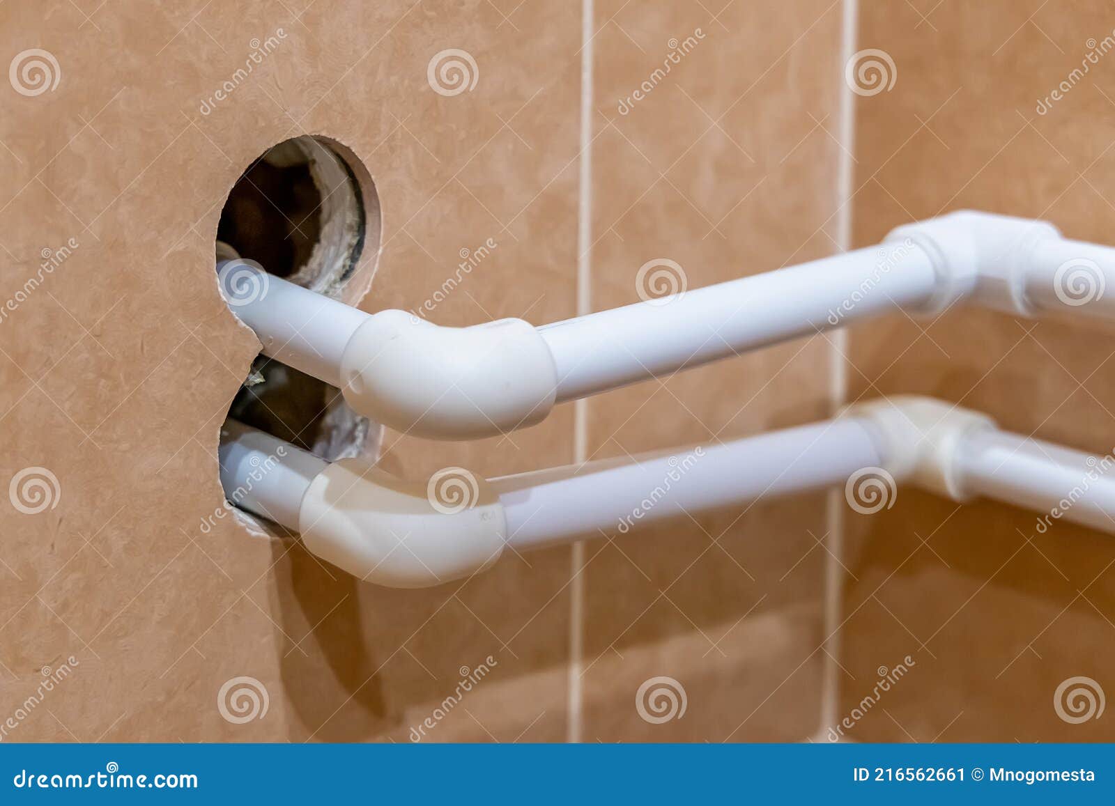 Poor Water Pipe Laying. Plastic Water Pipes in the Wall Stock Image