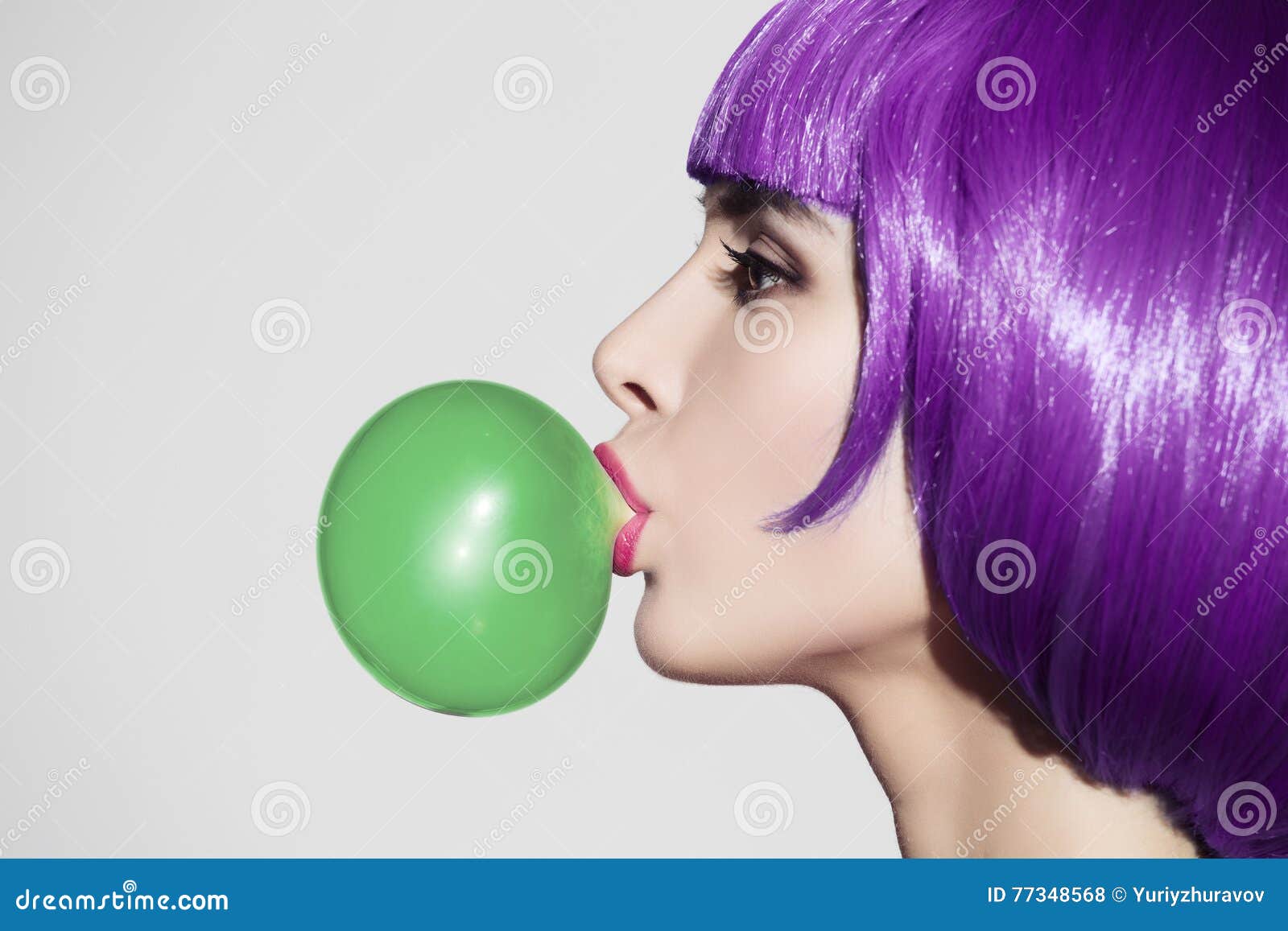 pop art woman portrait wearing purple wig. blow a green bubble