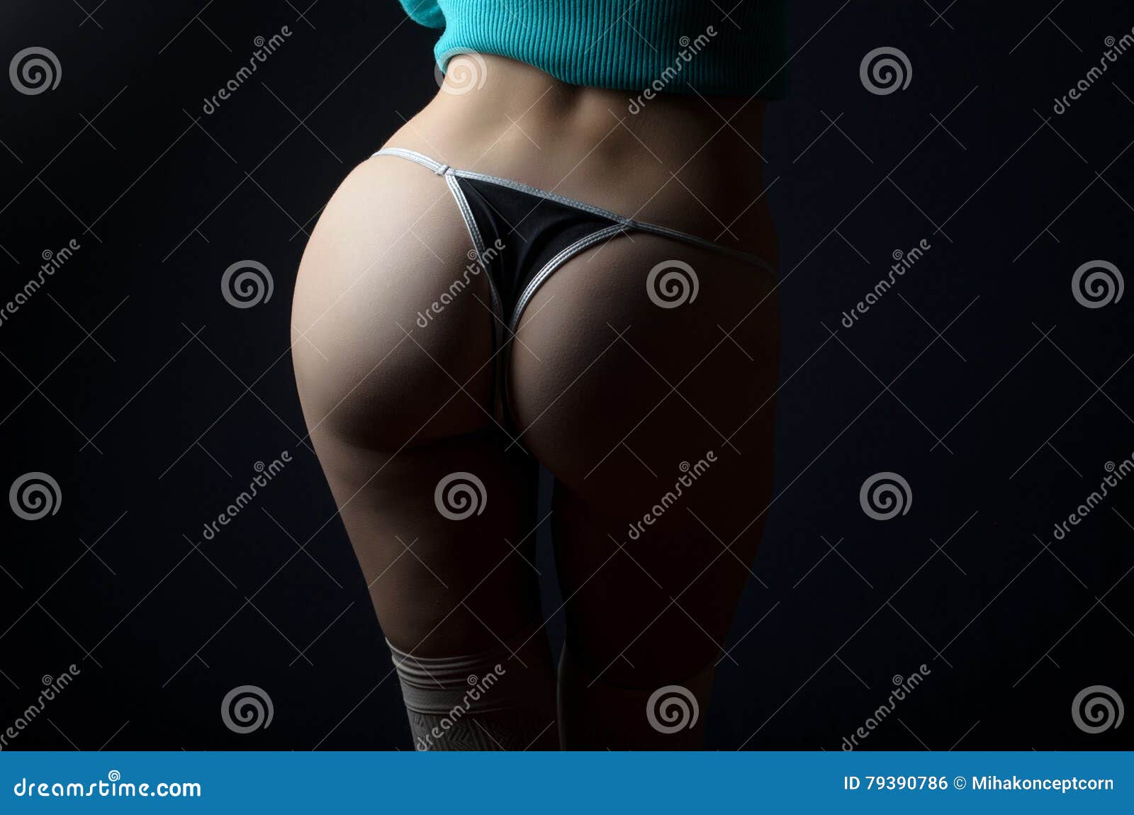 Closeup Of A Sexy Woman Wearing Black Thong Stock Photo, Picture