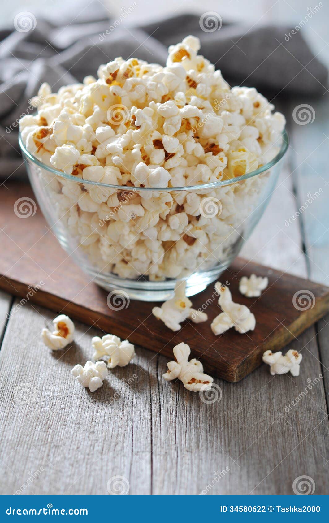 Popcorn in glass bowl stock photo. Image of crunchy, nobody 34580622