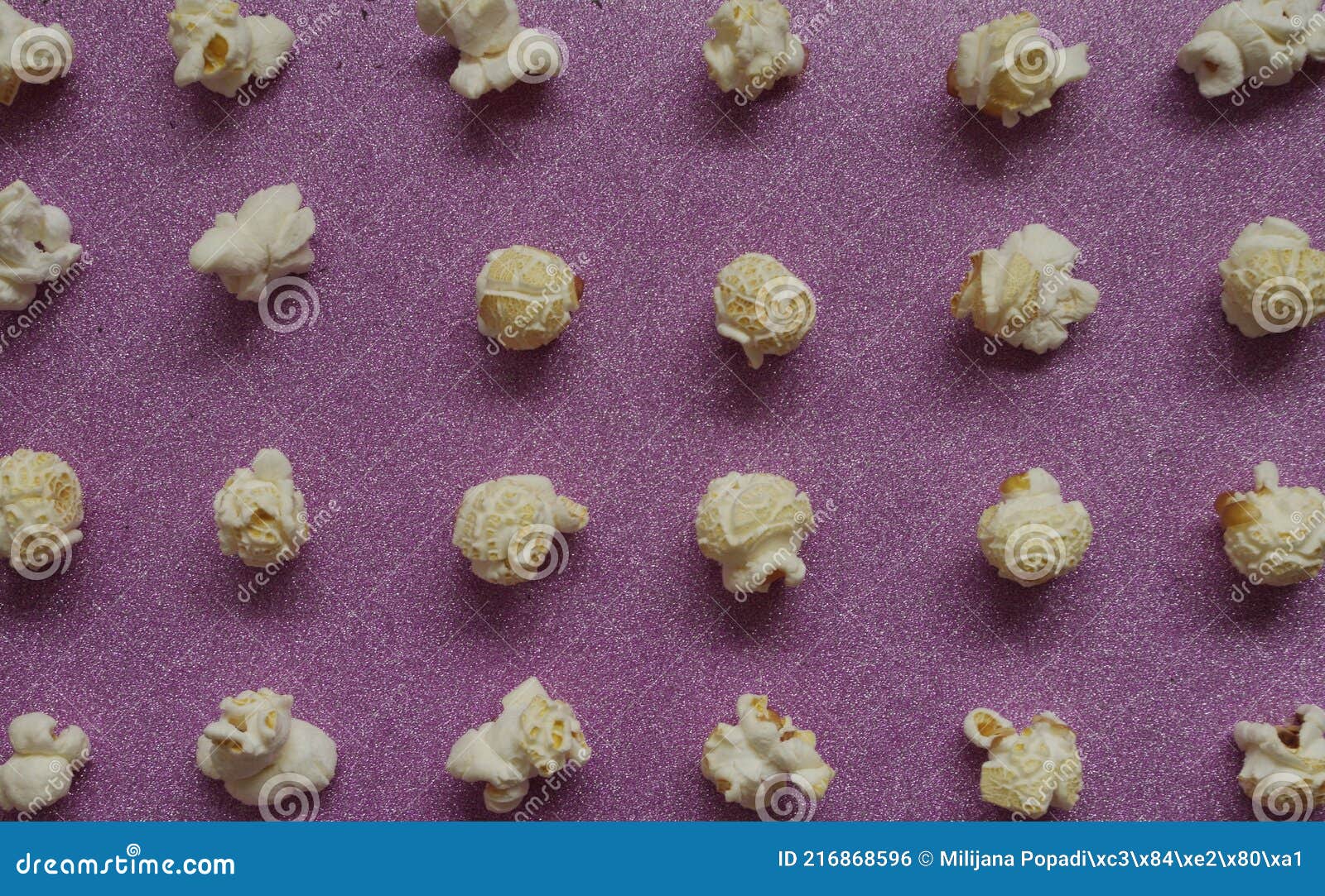 Popcorn on Pink Glitter Background. View from Above Stock Photo Image