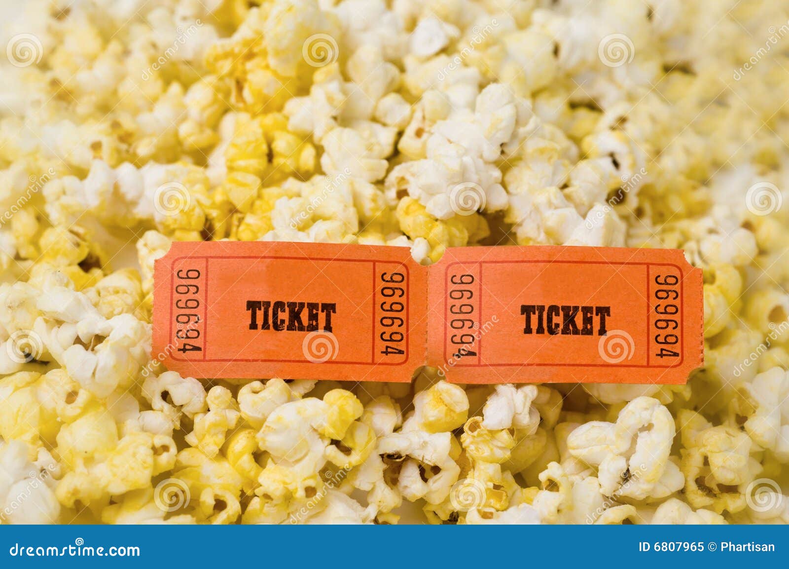 Popcorn and two tickets stock image. Image of fare, admission 6807965