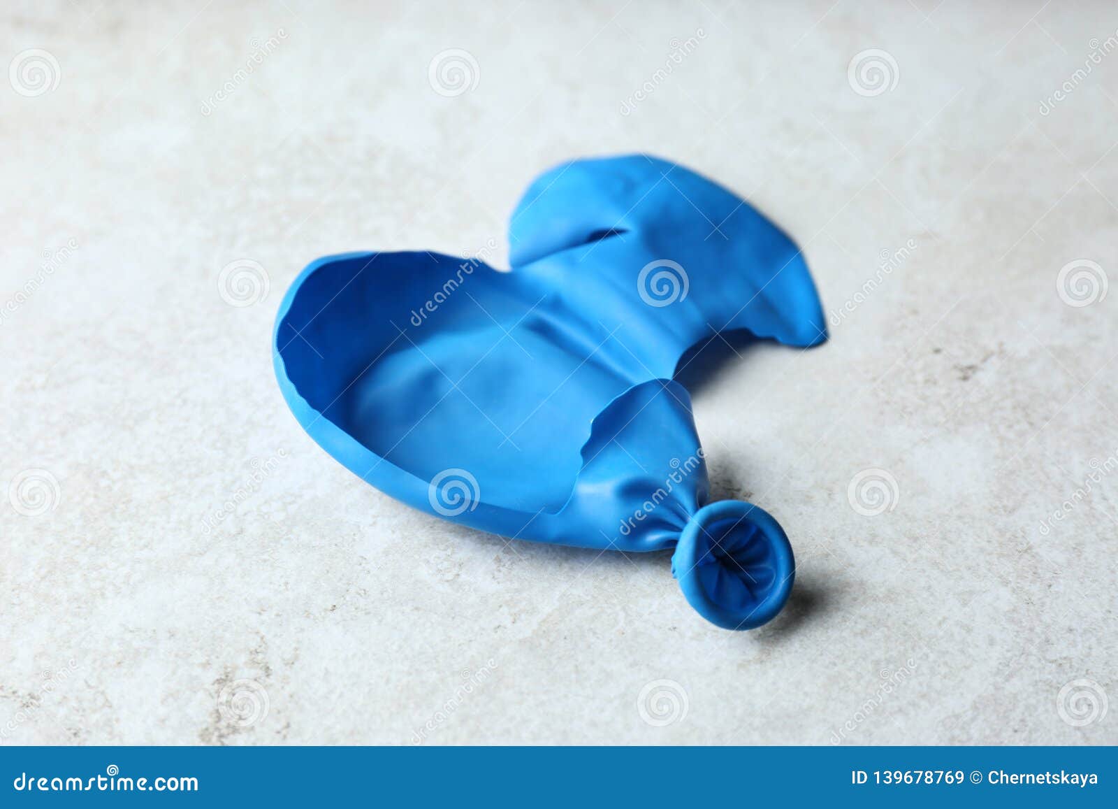 Popped blue latex balloon stock image. Image of destruction 139678769