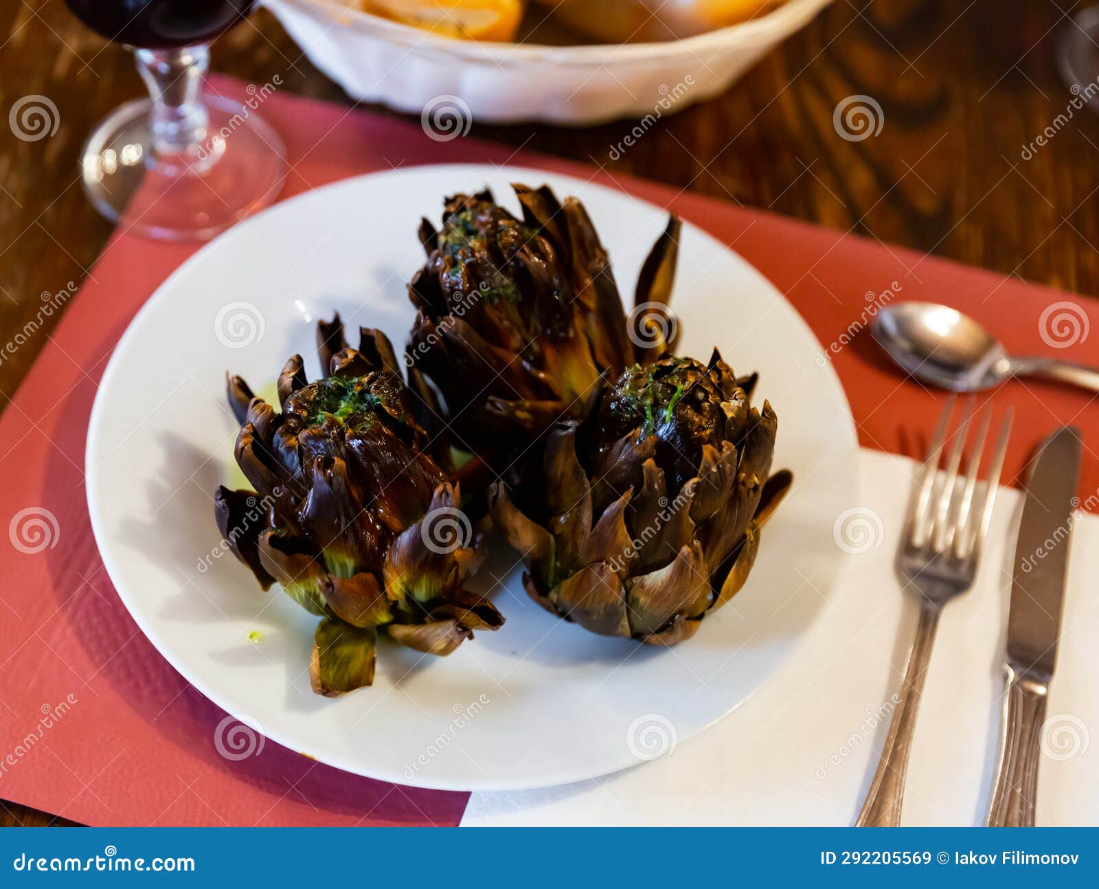 Popular Spanish Vegetarian Appetizer of Broiled Artichokes on Plate