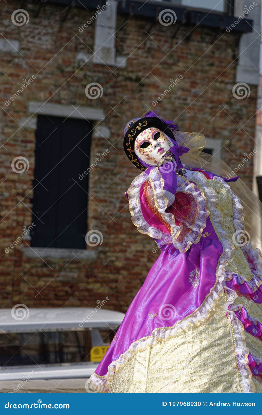 porait of a costumed venitian performer